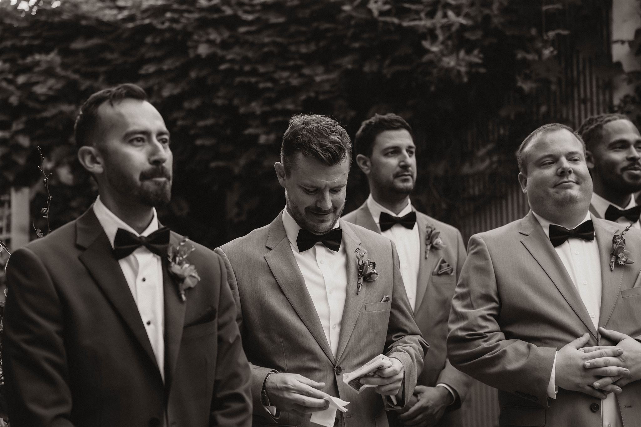 groom and groomsmen at ceremony altar