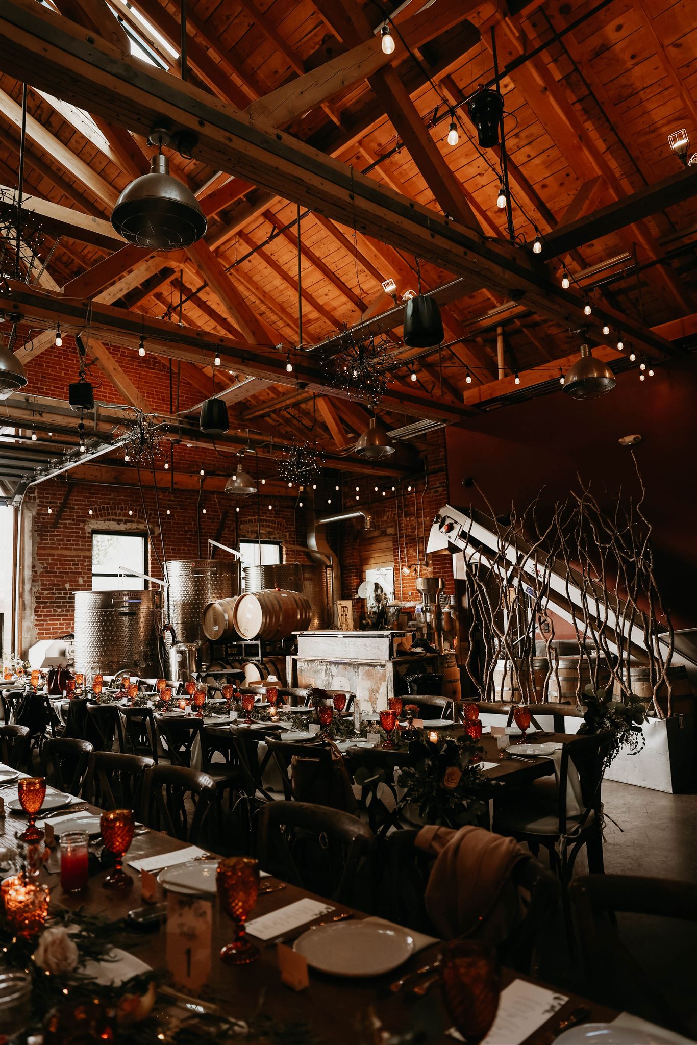 reception tables in the winery at fall wedding in colorado 