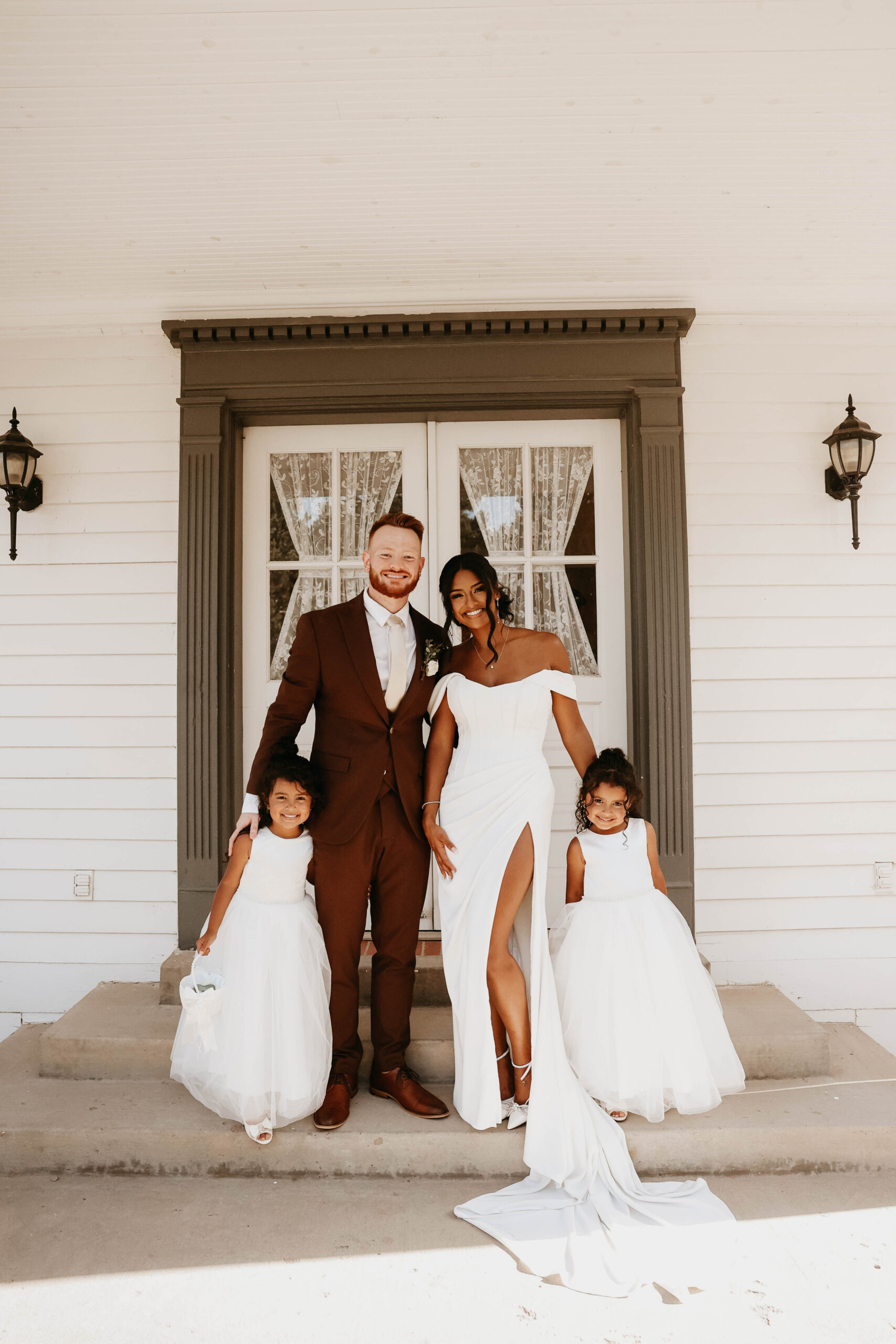 bridal couple and daughters portrait 