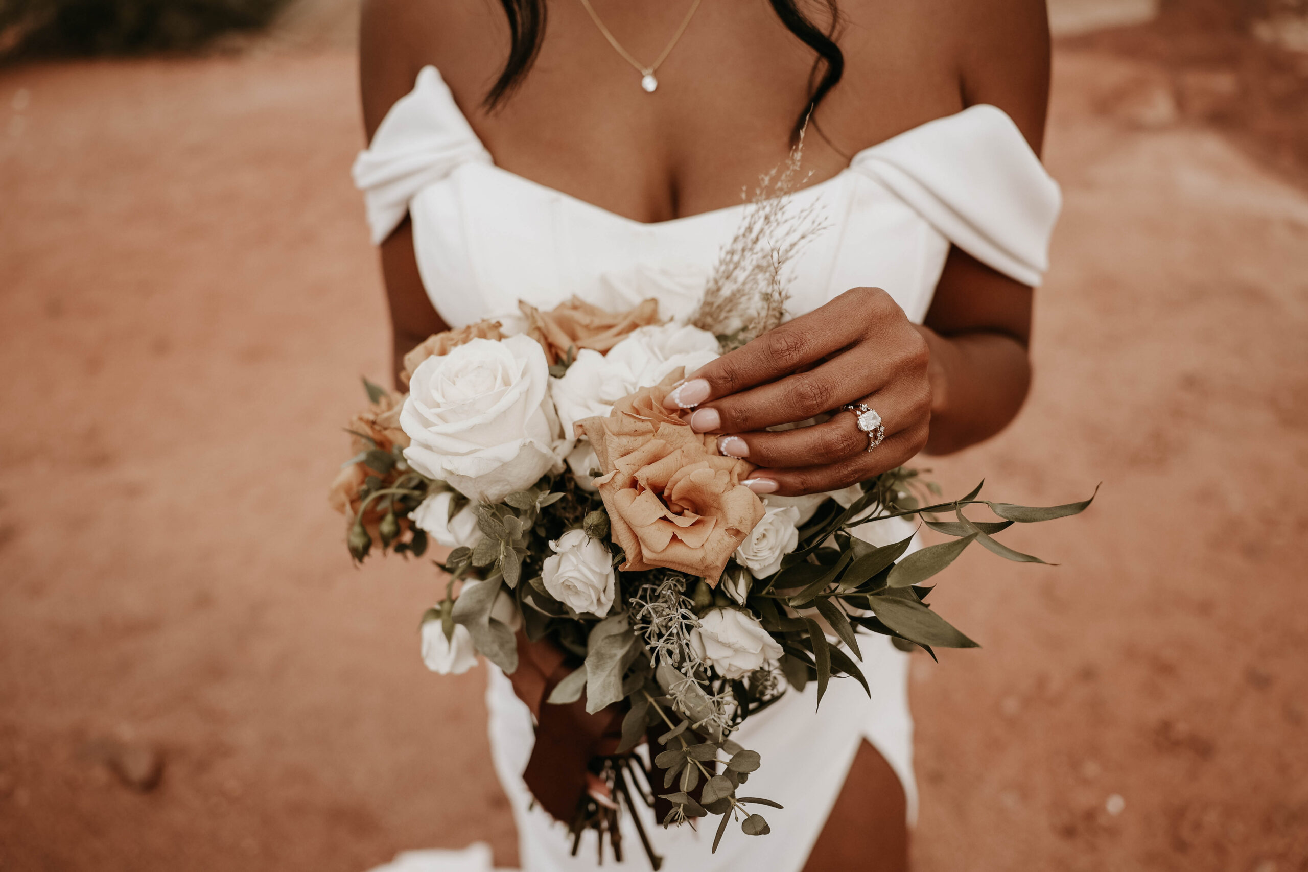 detail shot of bride's bouquet and ring at outdoor wedding in Colorado