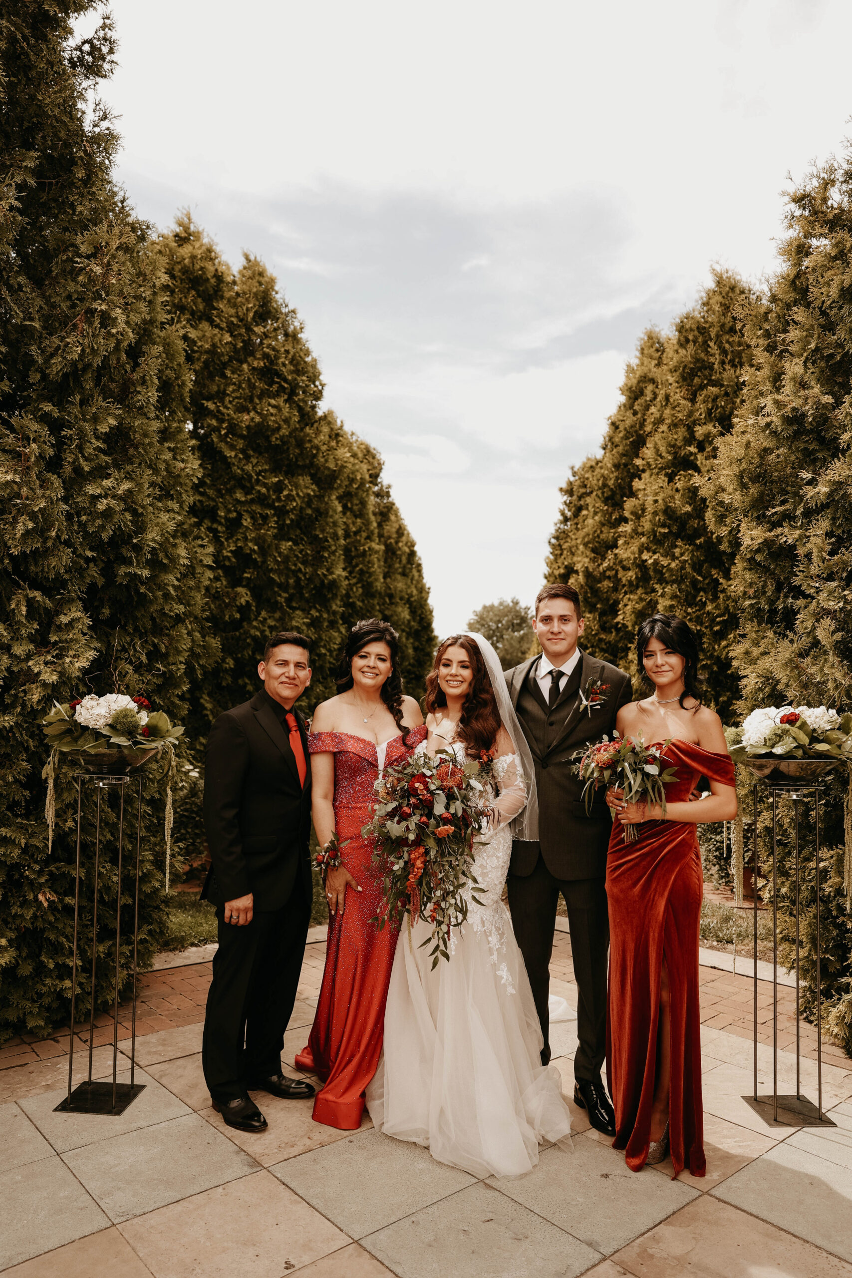 bridal couple and family portraits in the romantic denver botanic gardens
