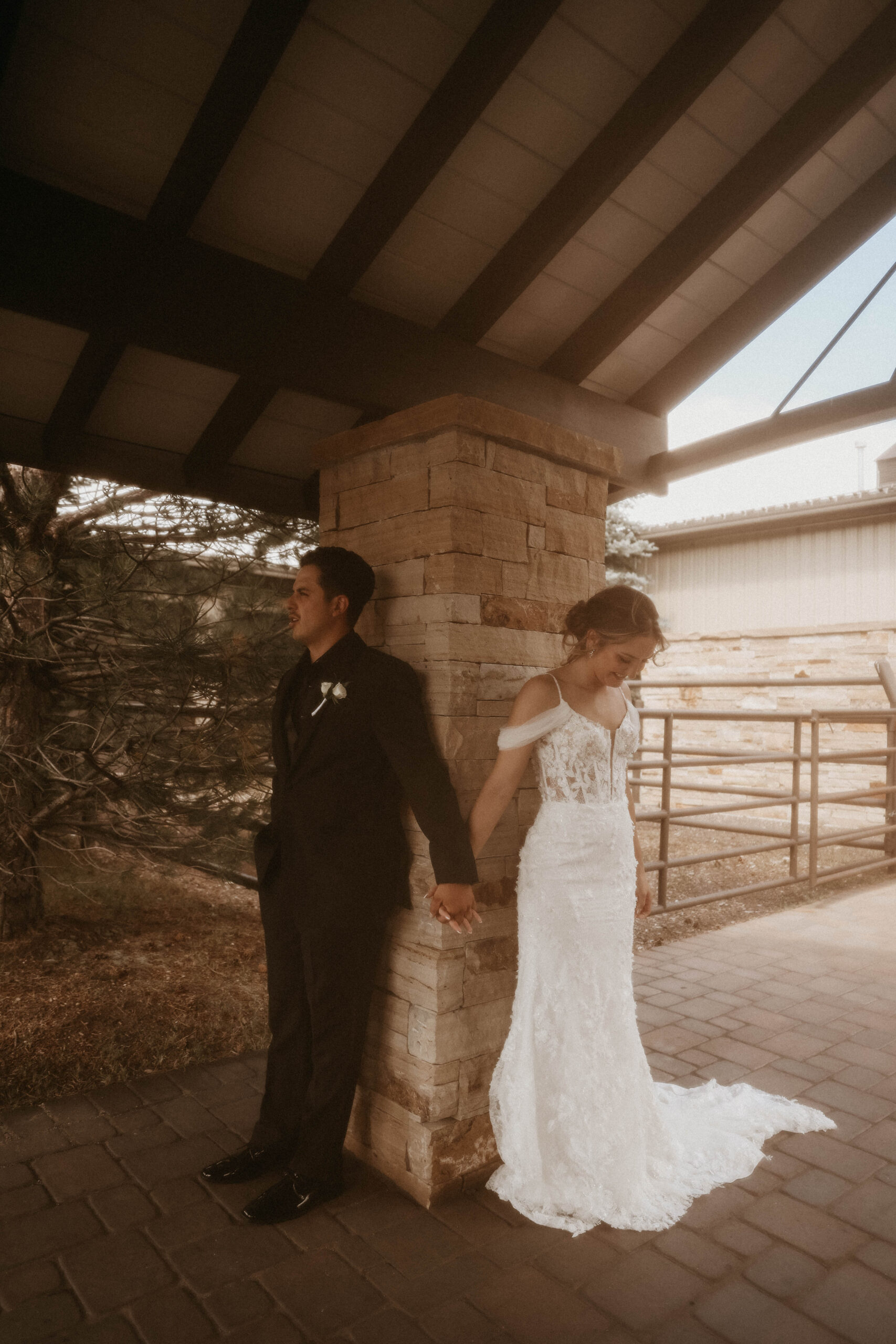 bride and groom holding hands before first look at Spruce Mountain Ranch Wedding 