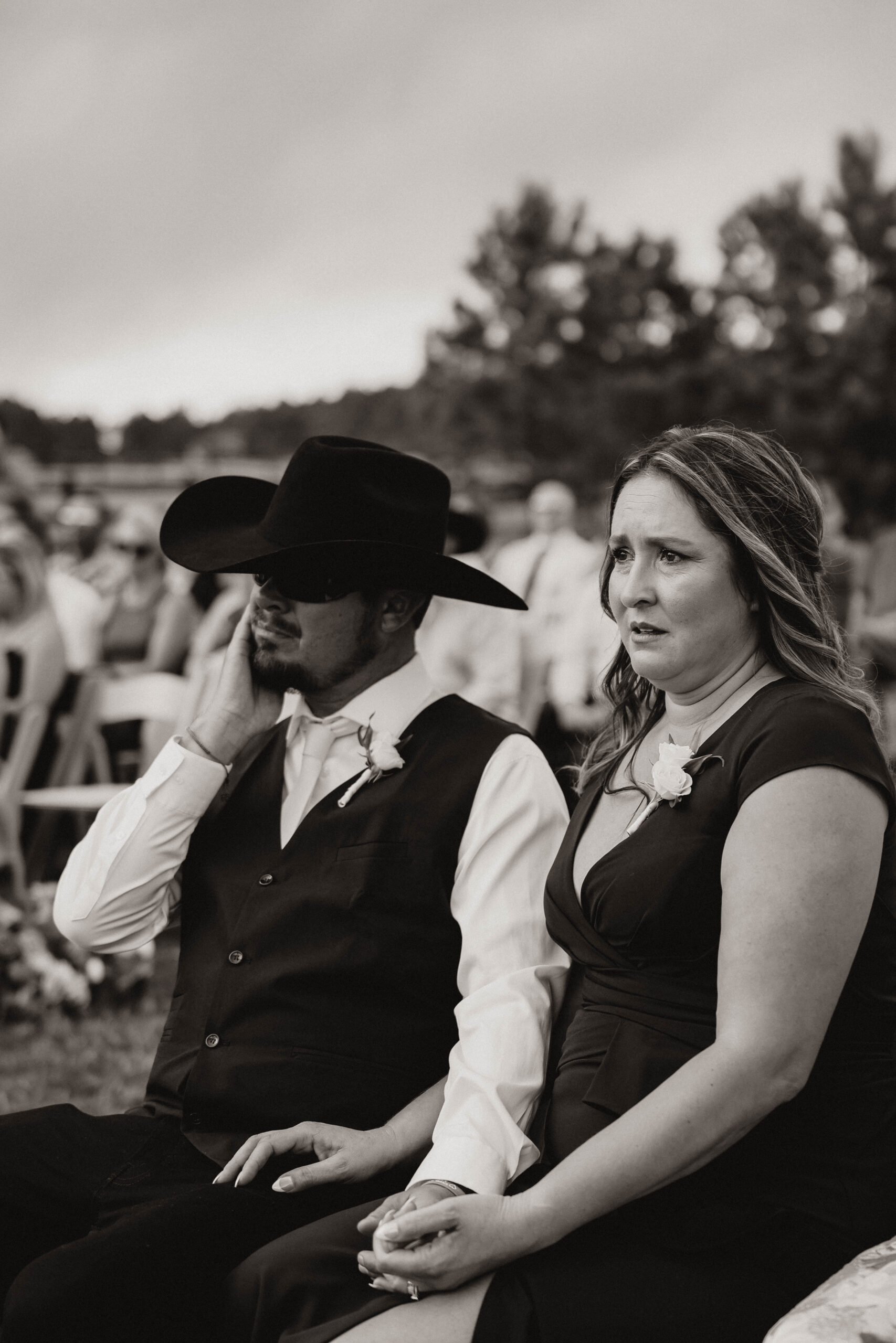 bride's parents tearing up at the  Spruce Mountain Ranch Wedding ceremony