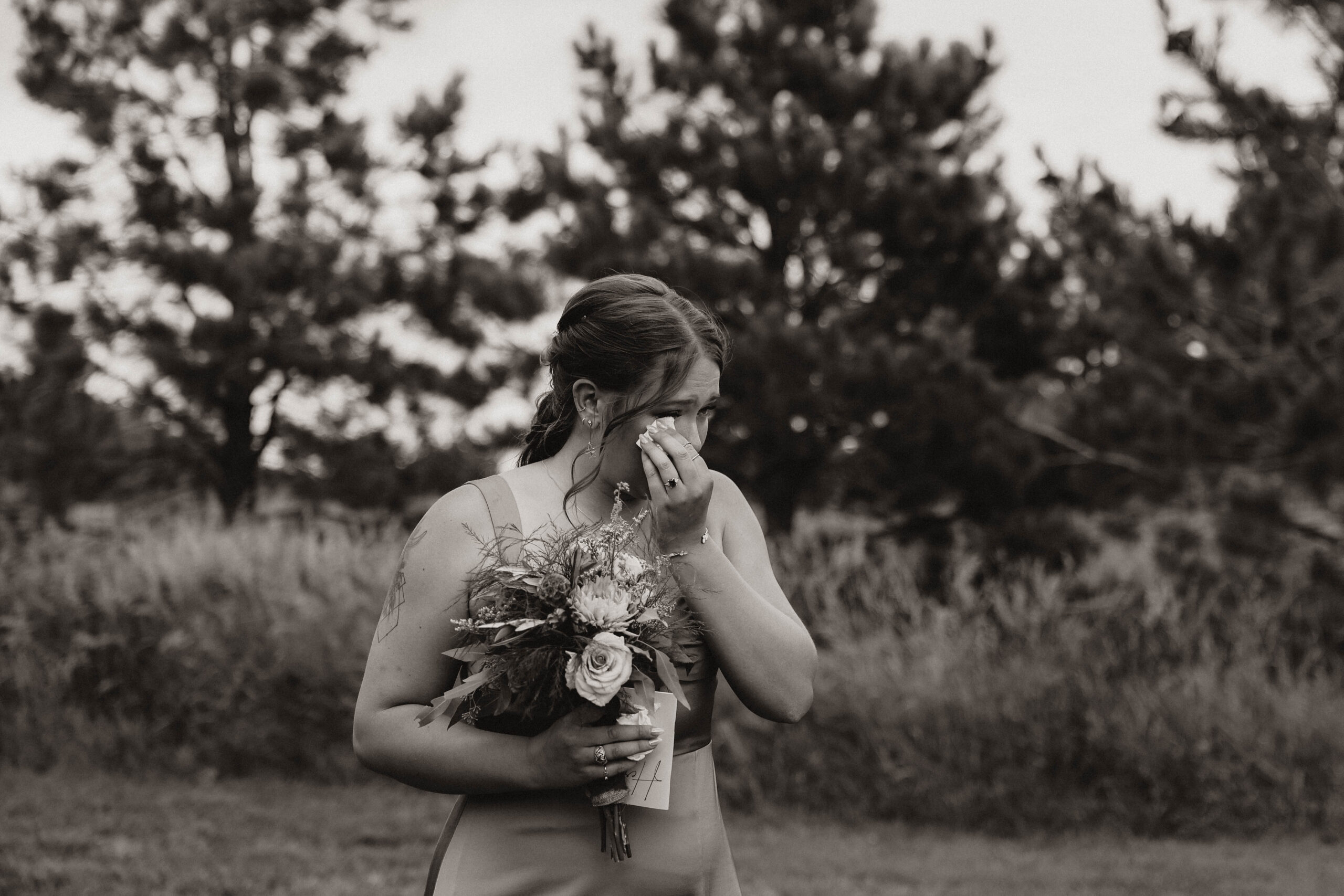 bridesmaid crying at Spruce Mountain Ranch Wedding 
