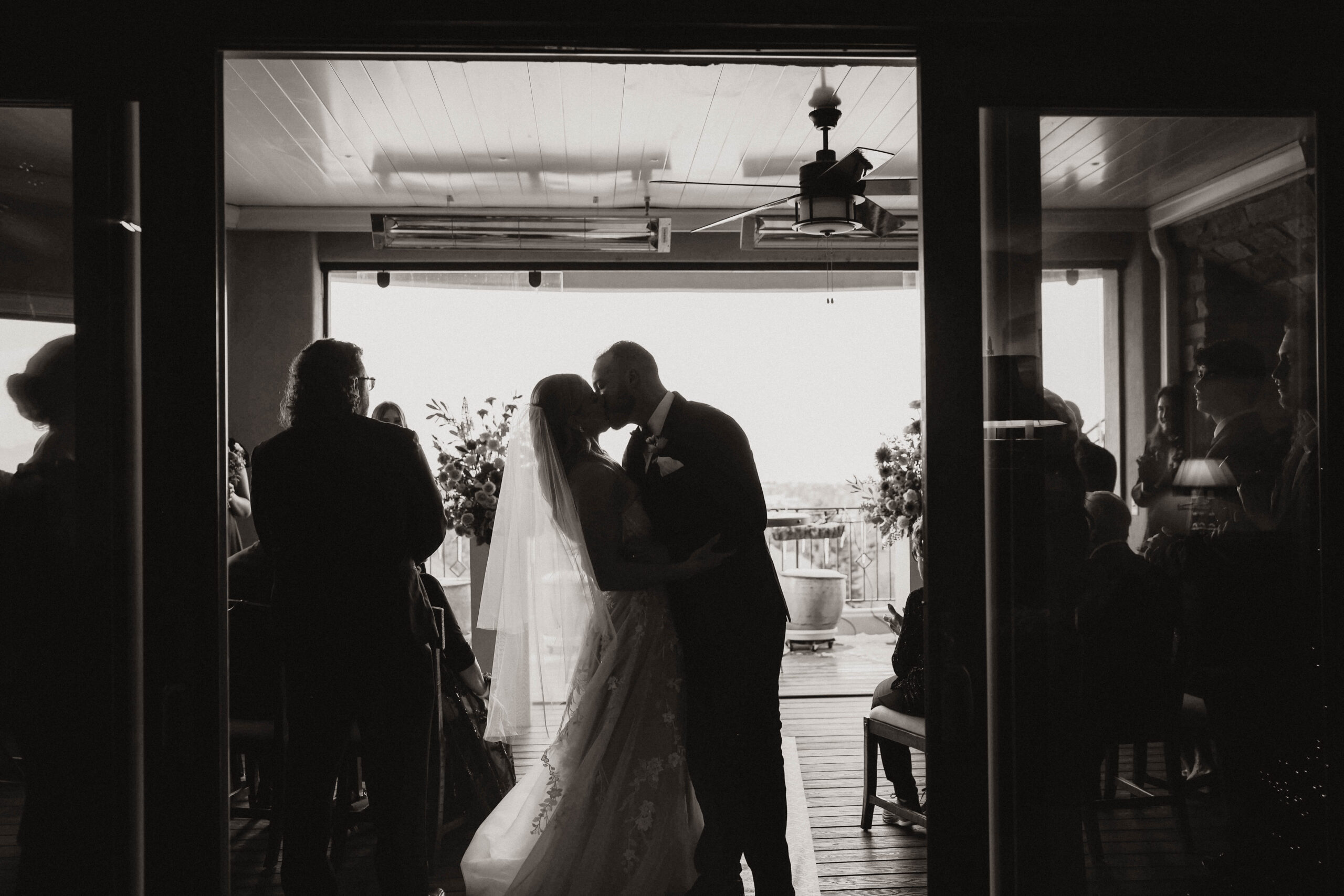 bride and groom kissing at Colorado micro wedding ceremony