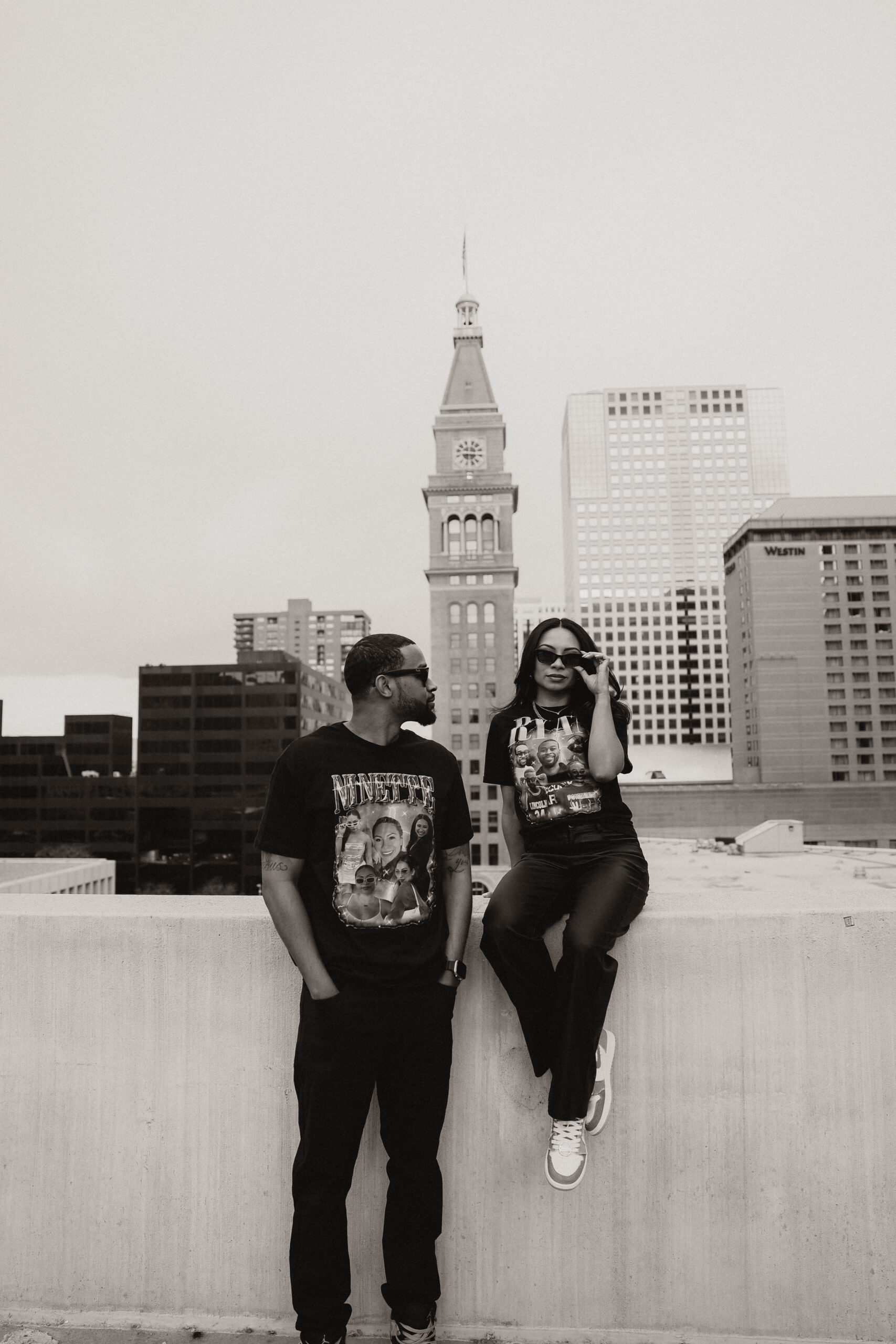 couple on a rooftop during their unique engagement shoot