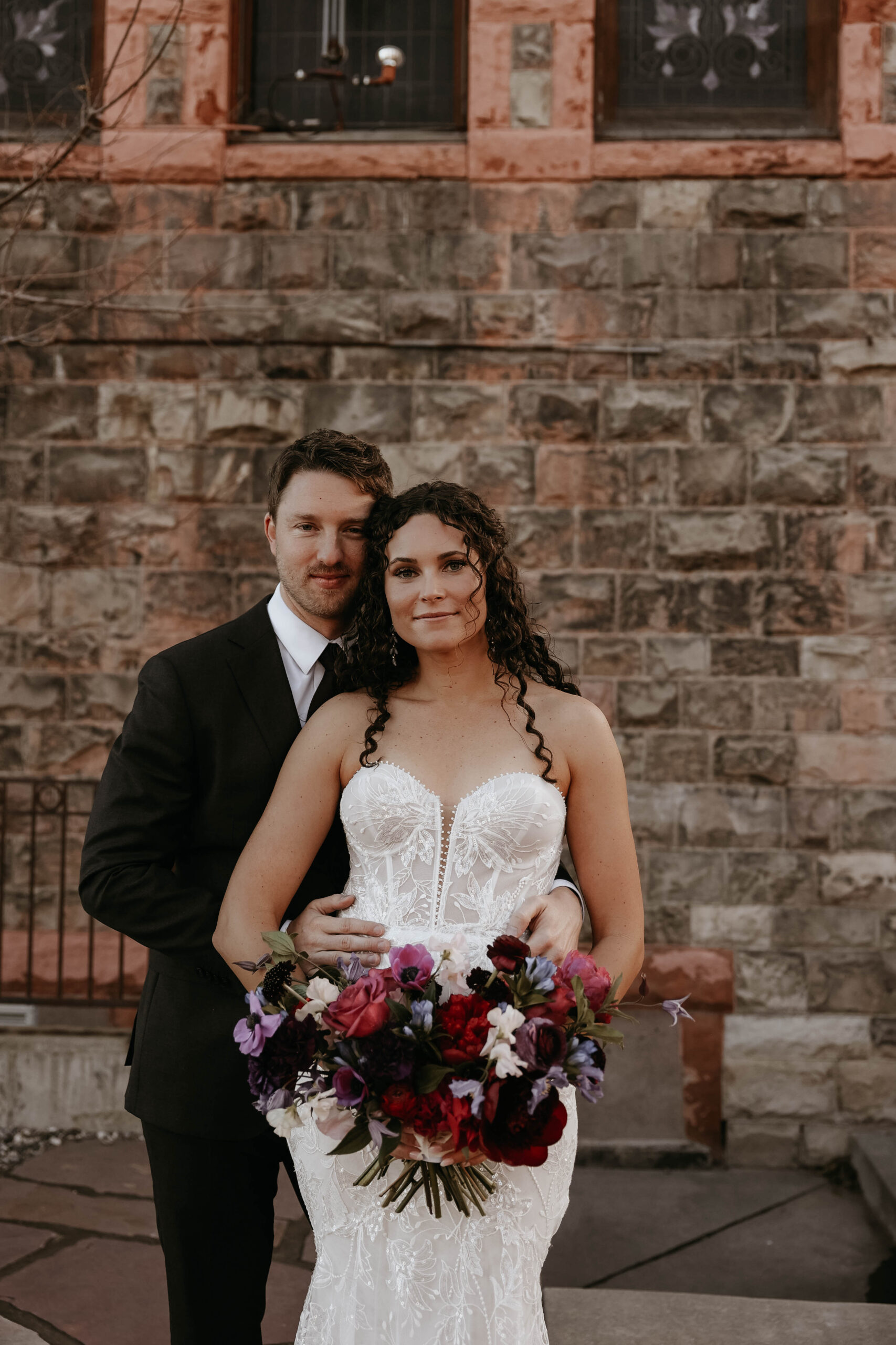 bride and groom portrait outside 