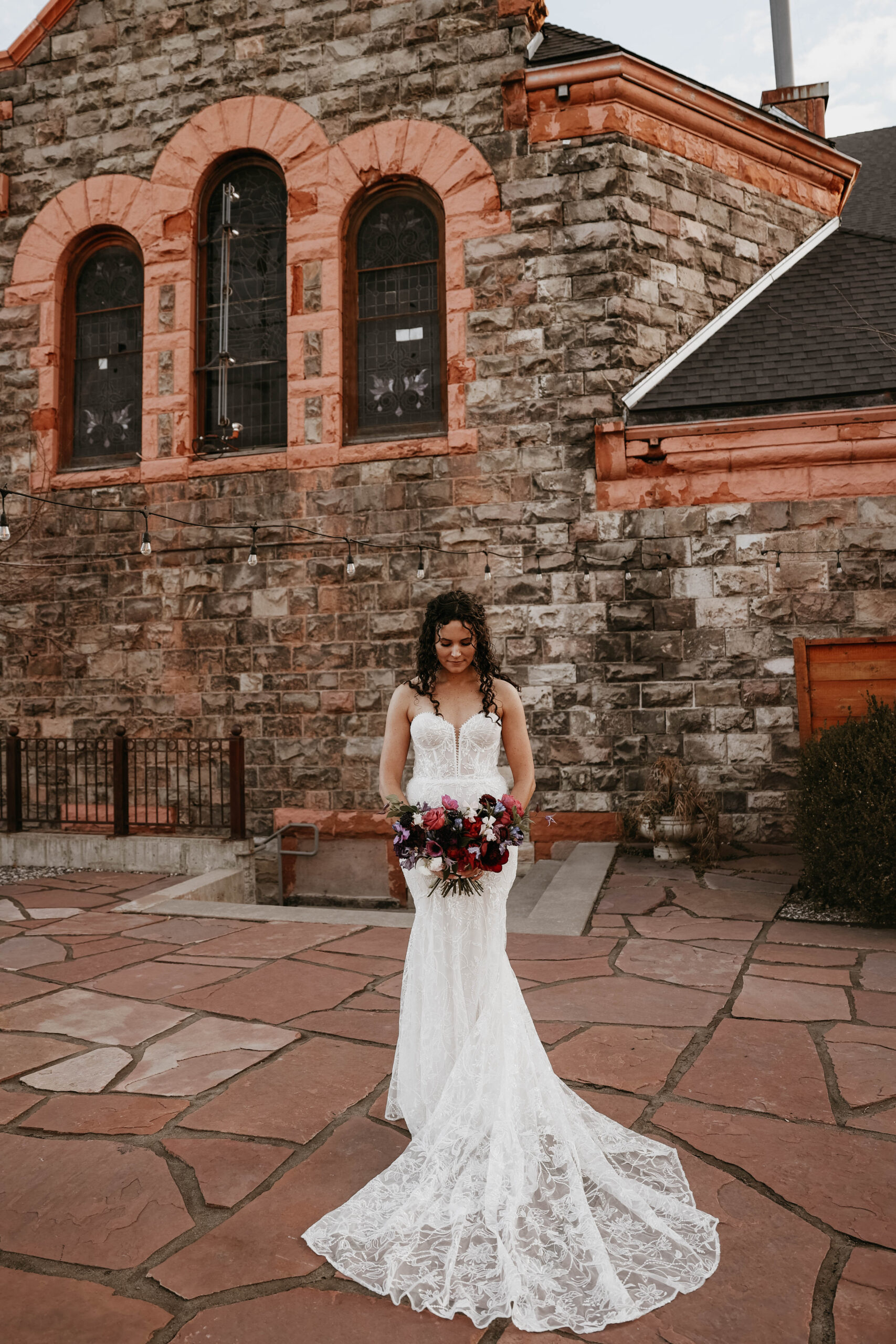 outdoor bridal portrait in front of the church 