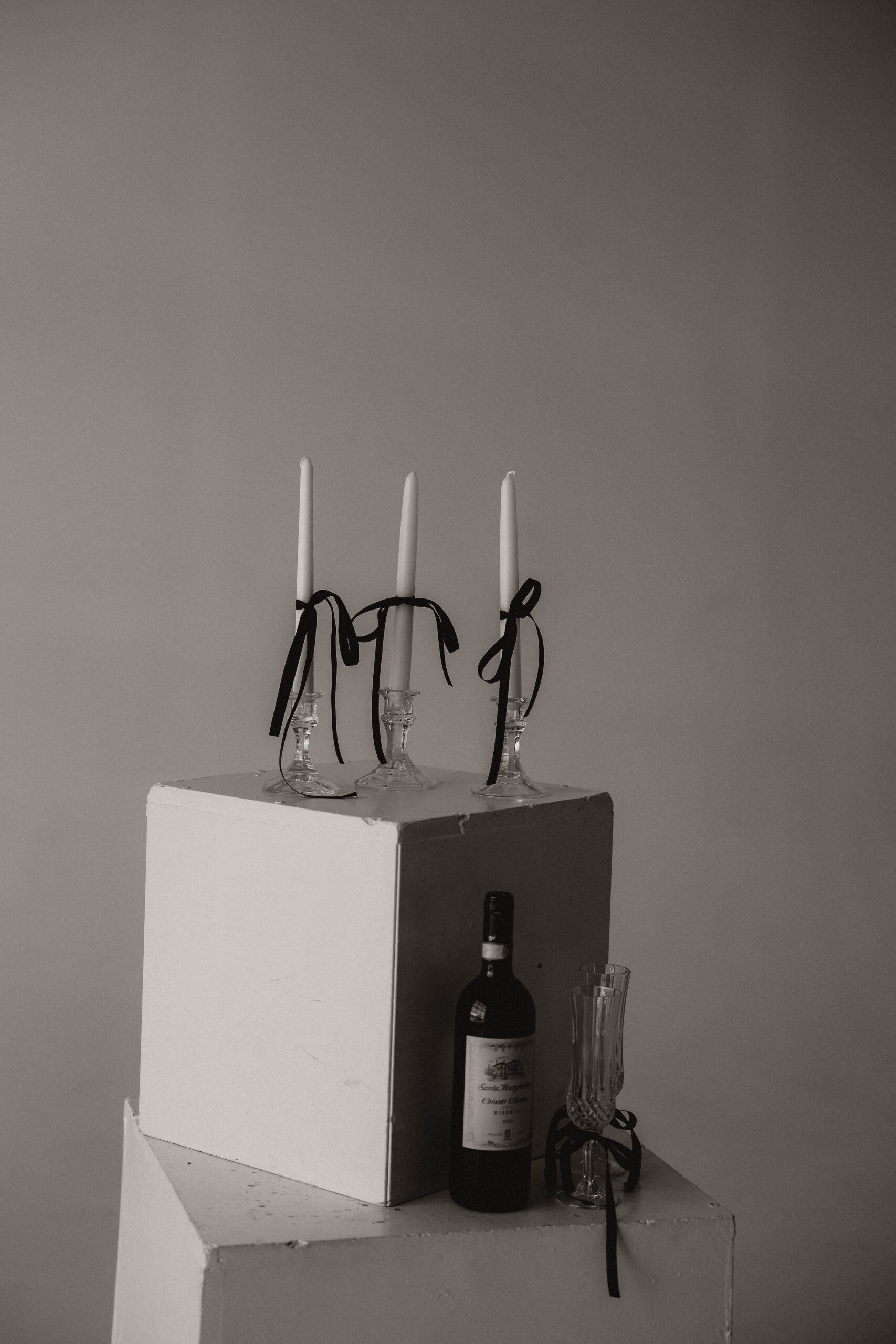 studio bridal photography prop boxes with candles and wine 