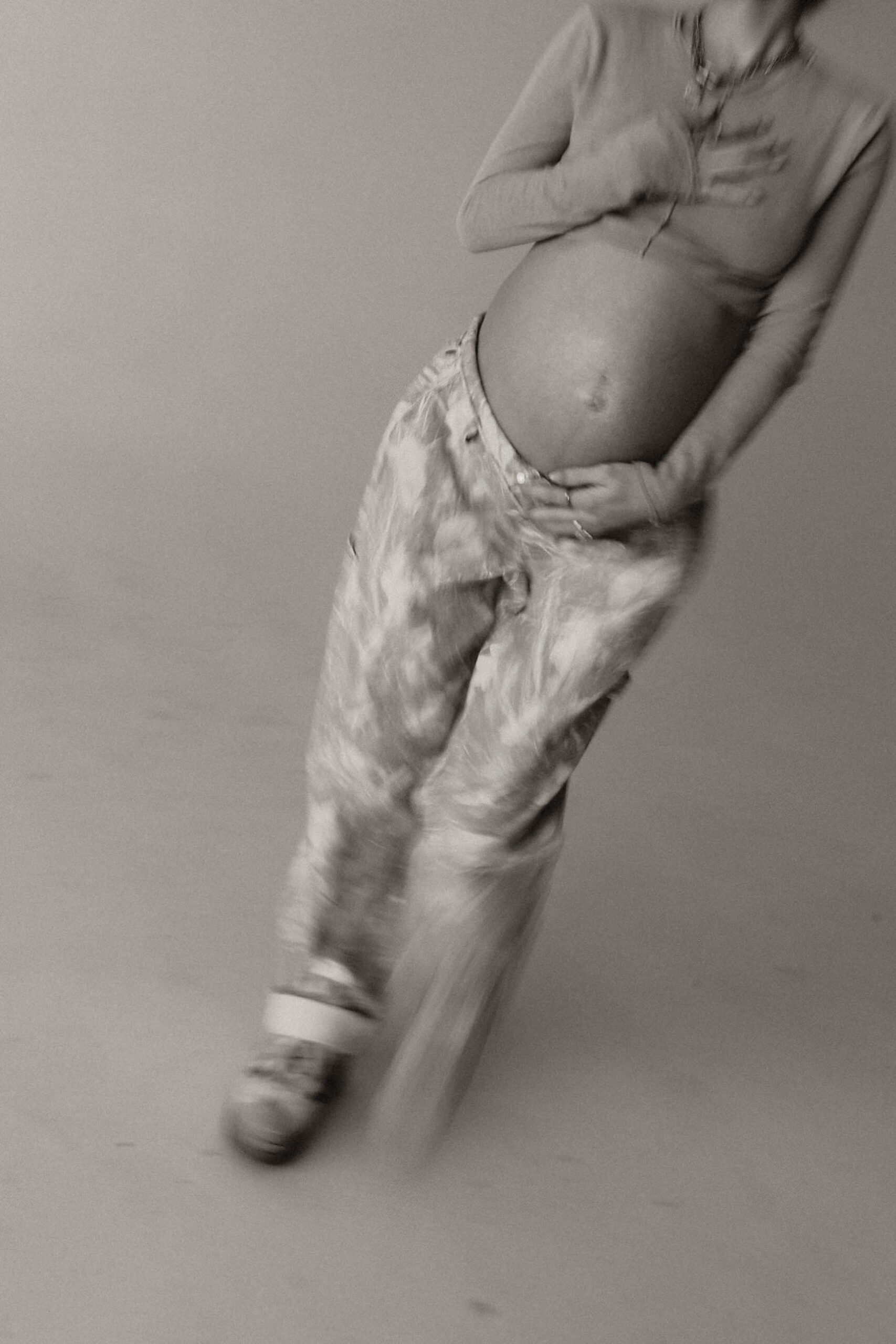 blurry photo of a woman's belly during denver maternity photoshoot