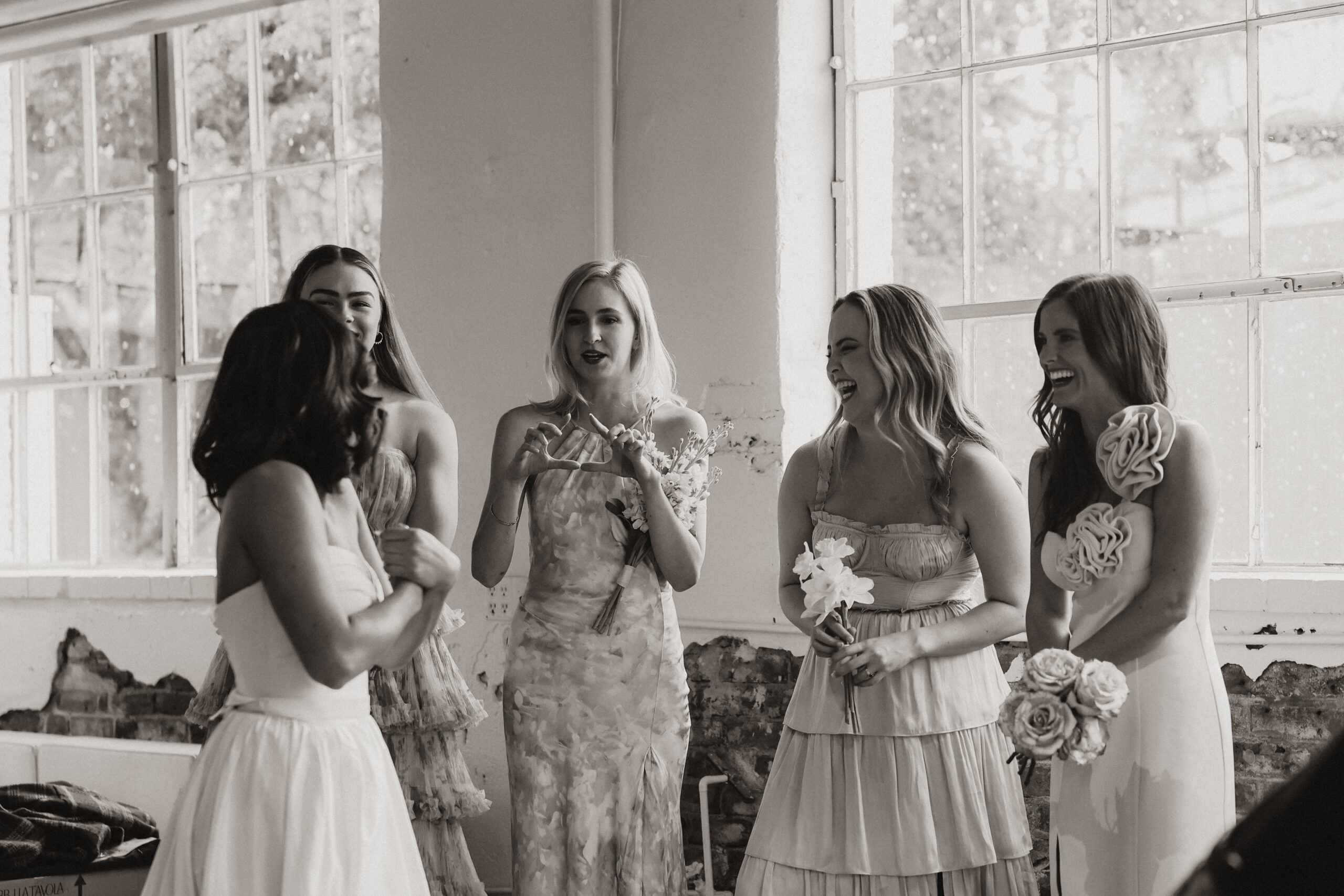 candid photo of bride and bridesmaids 