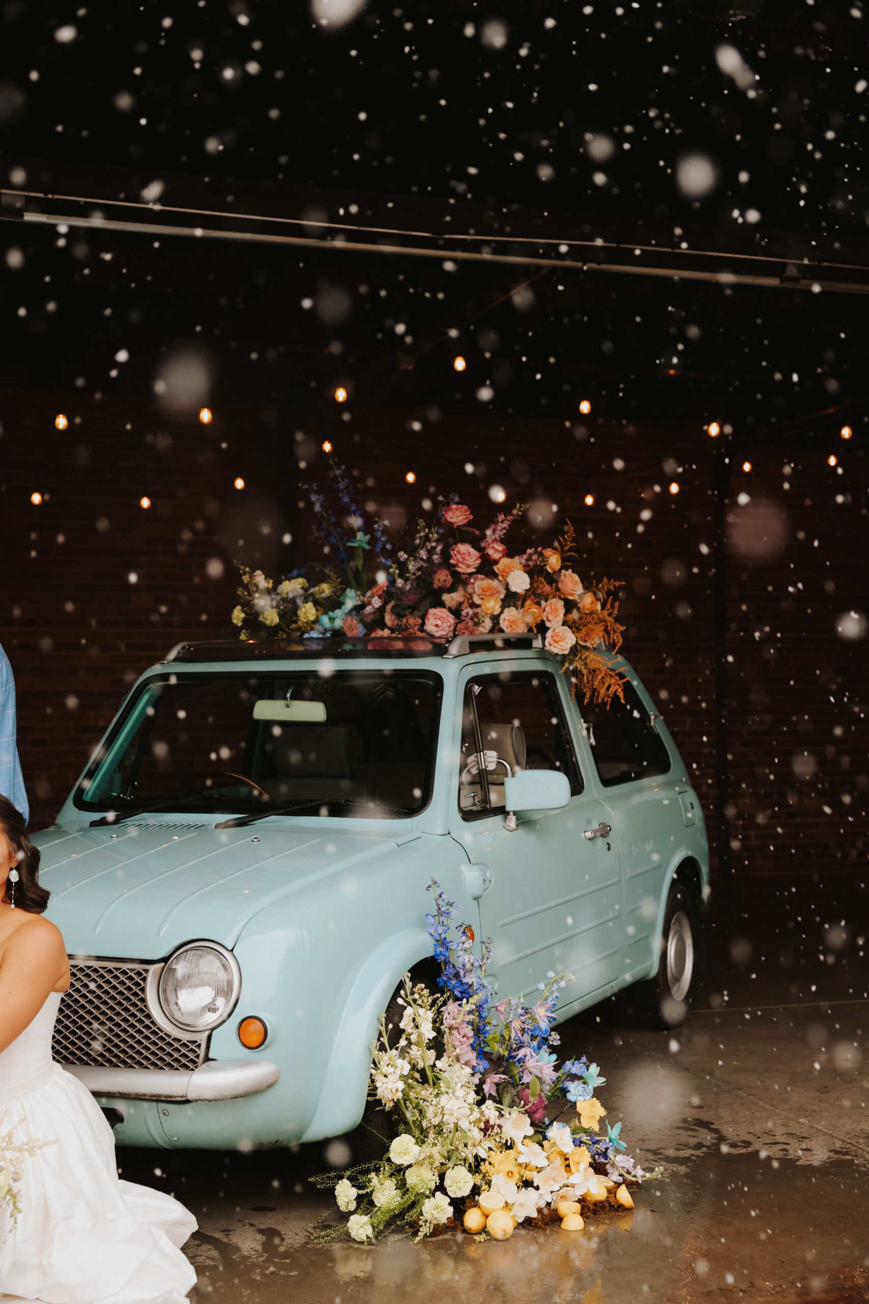 the blue floral styled car during a colorful spring wedding 