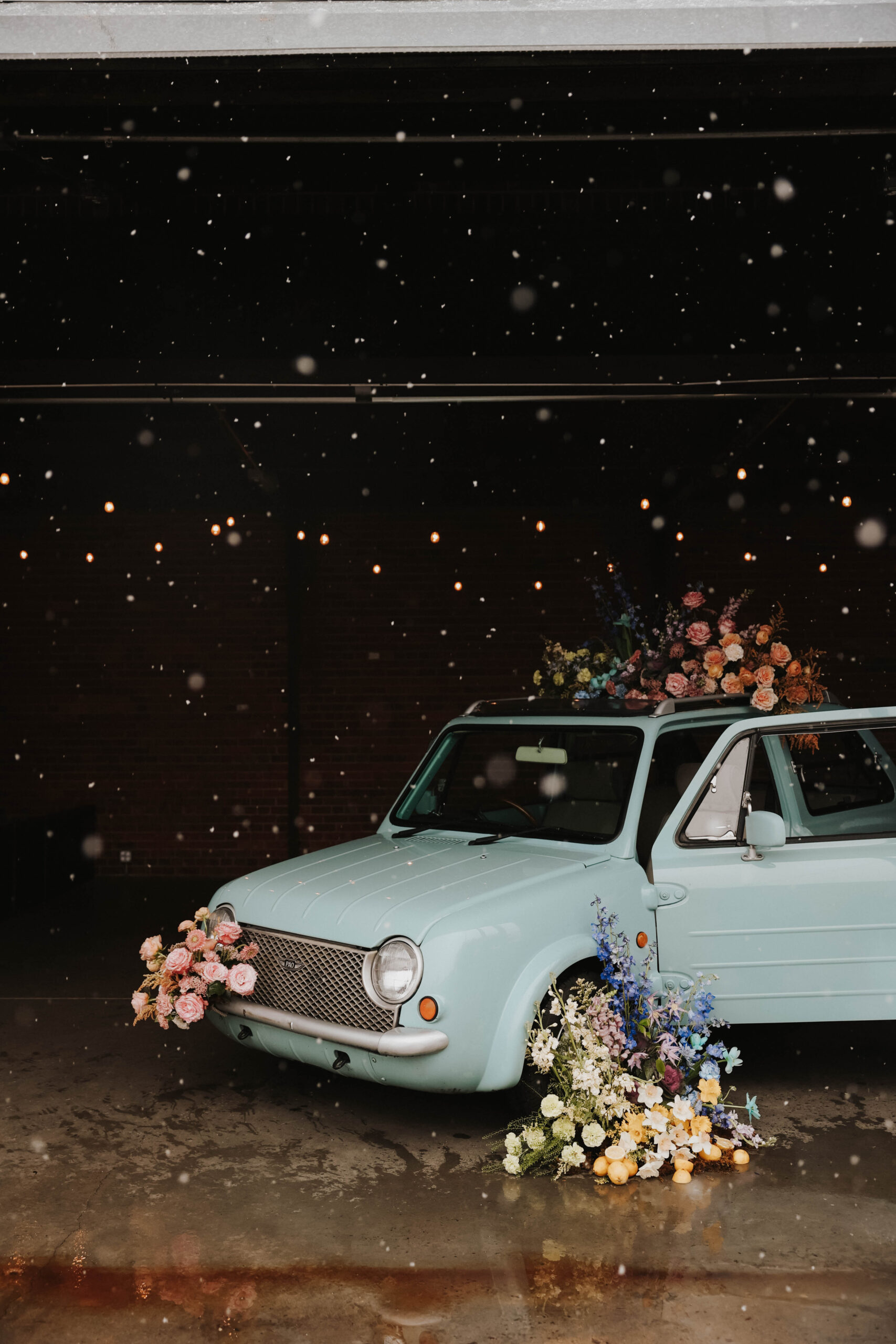 the floral styled car set up as it snows 