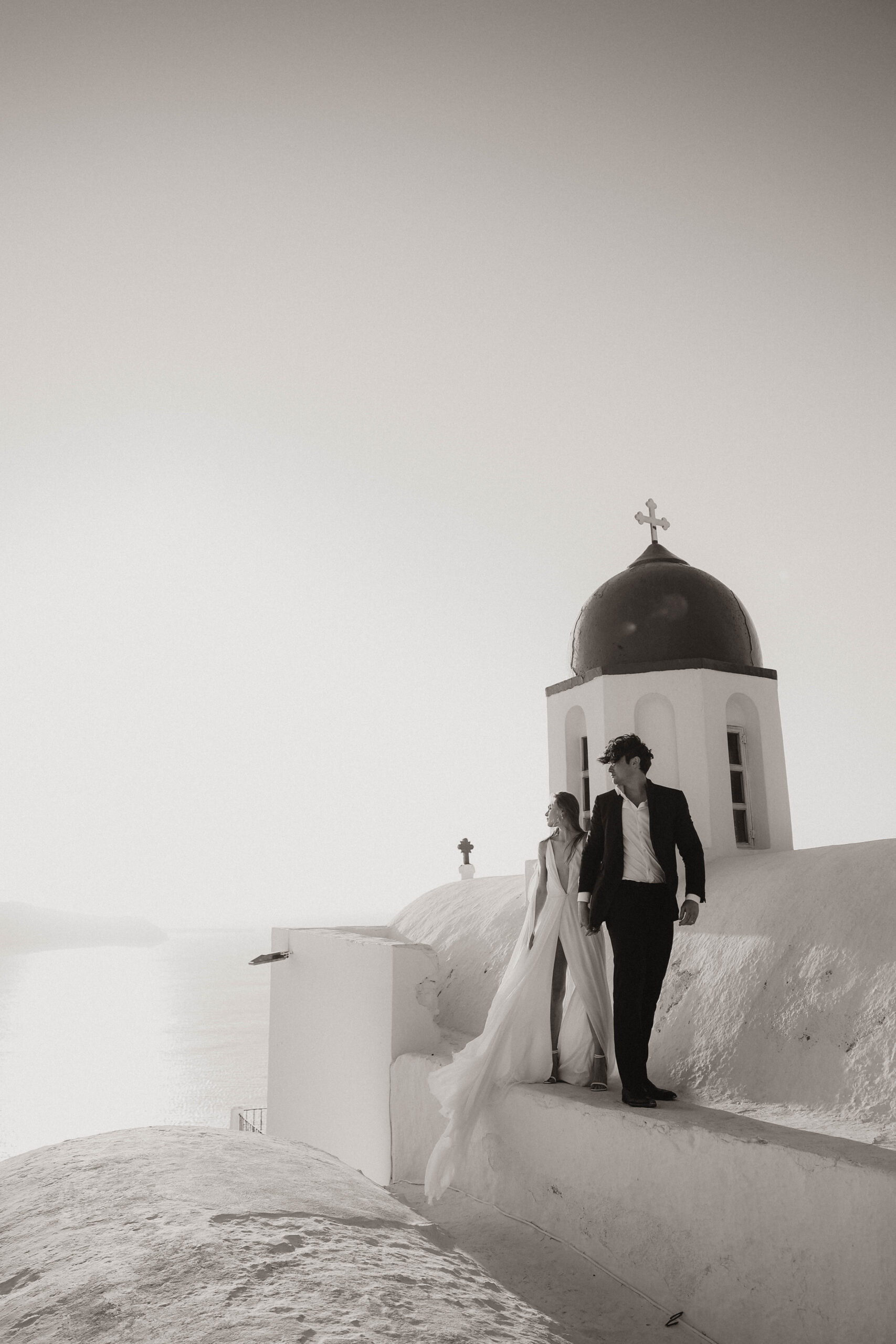 bride and groom on a villa roof in Greece 