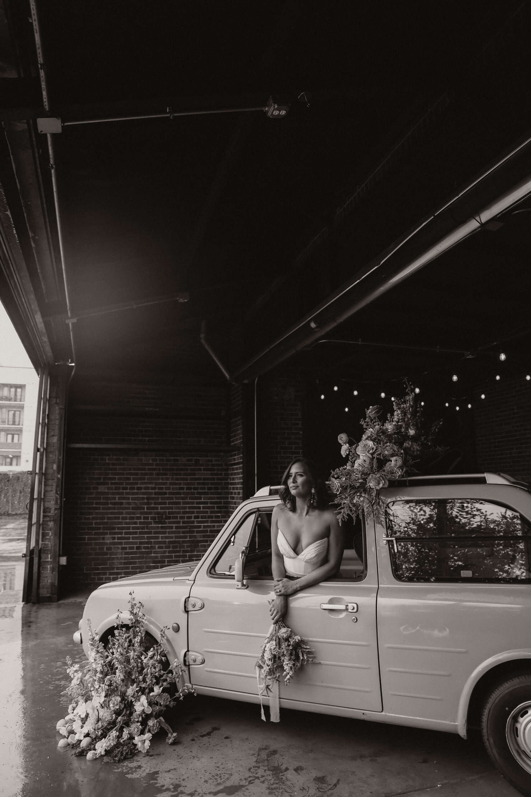 bridal portrait of her in the car 
