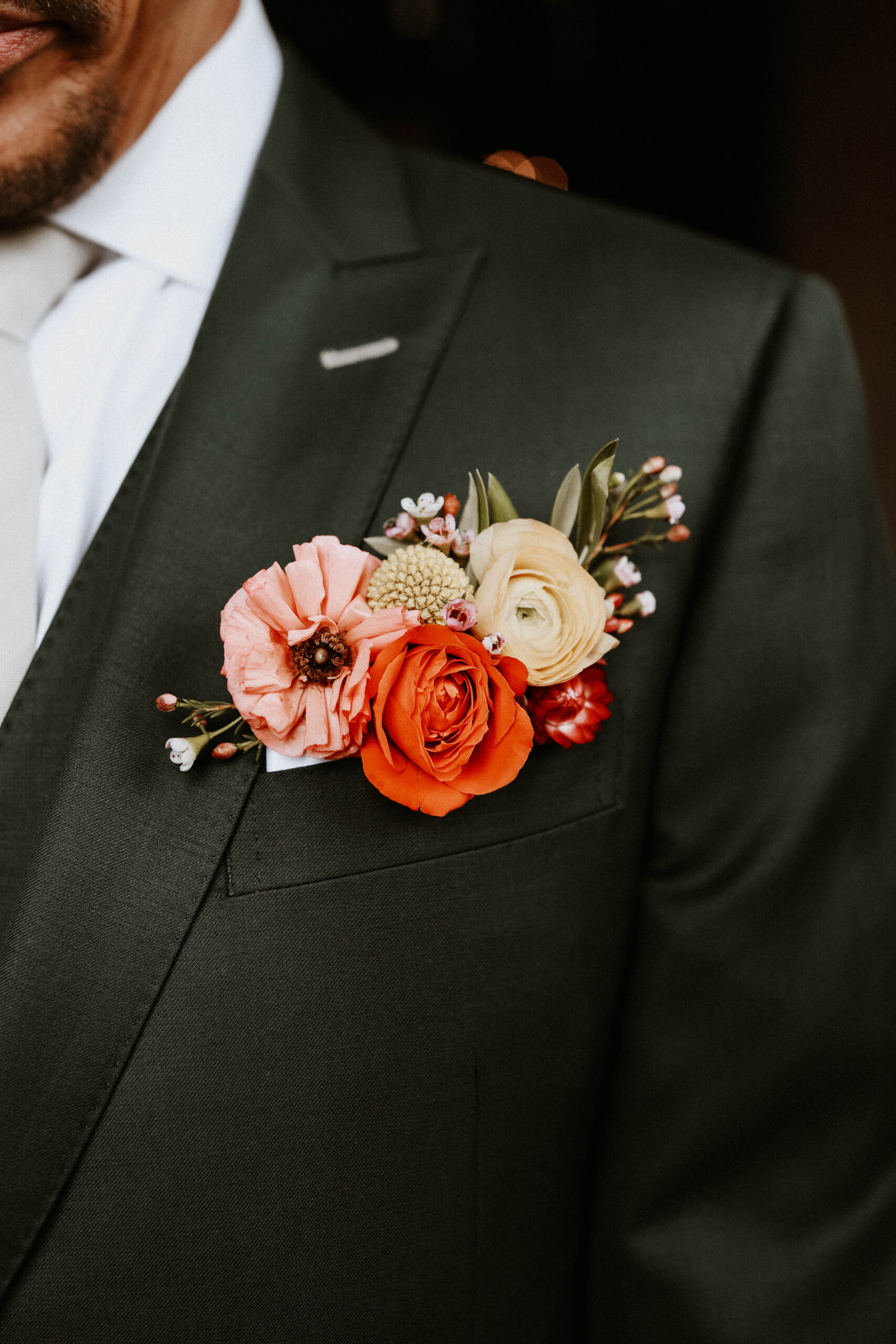 close up of groom's boutonniere