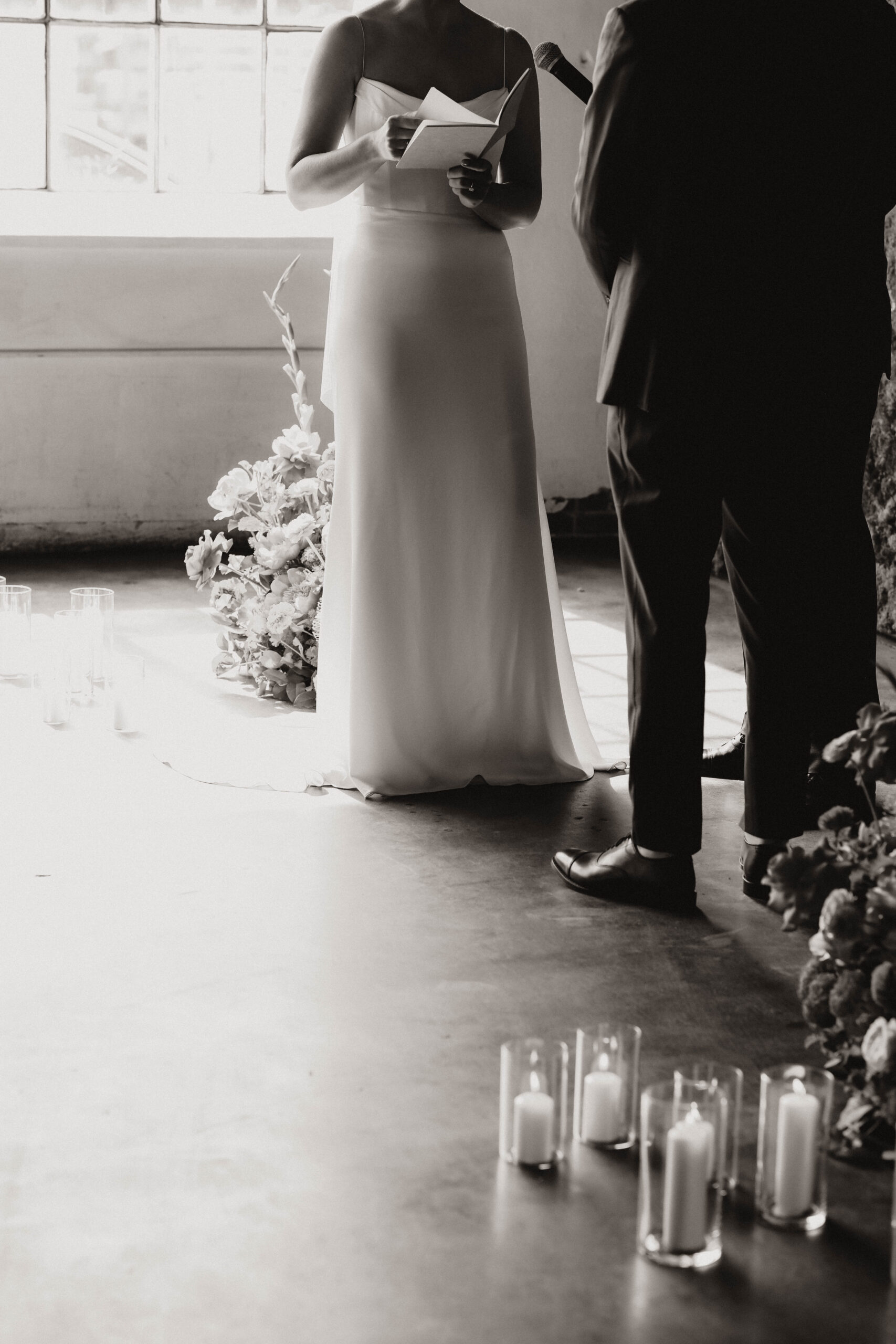 bride reading her vows at the ceremony 