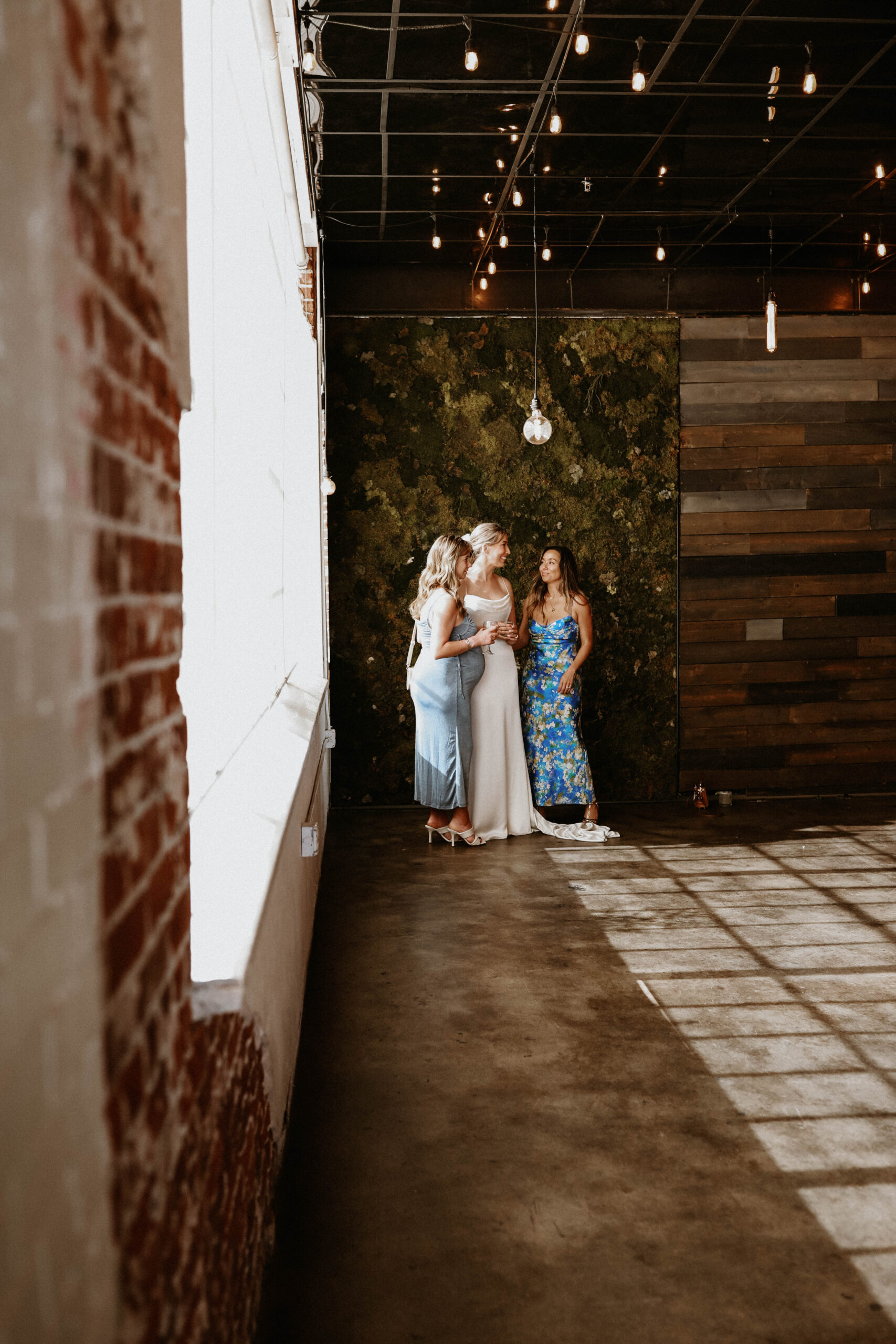 bride and guests talking during cocktail hour at one of the most perfect Denver Colorado venues