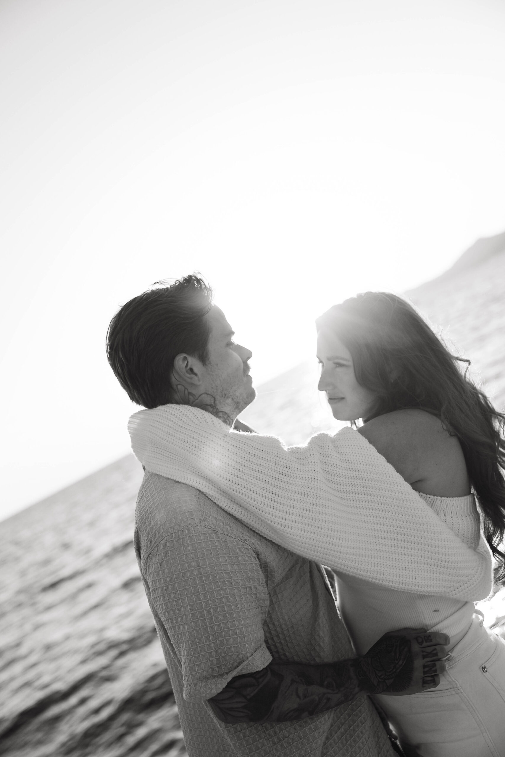 a couple looking at each other during their couples session