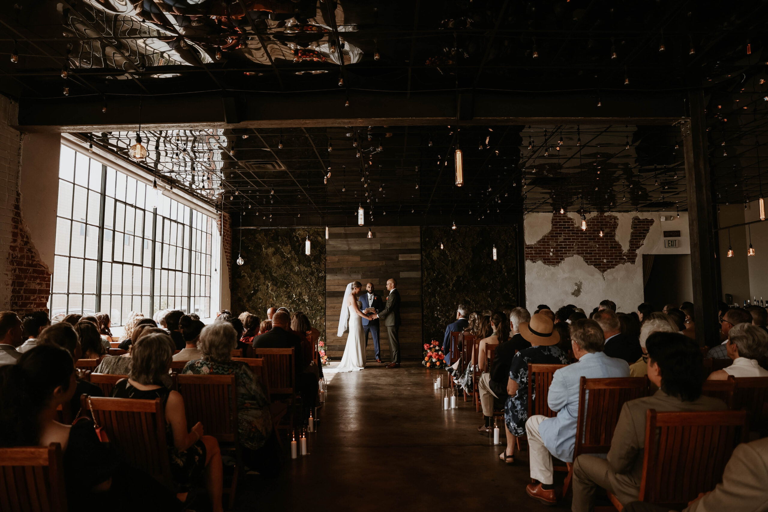 wide shot of bride and groom at the altar at one of the most perfect Denver Colorado venues