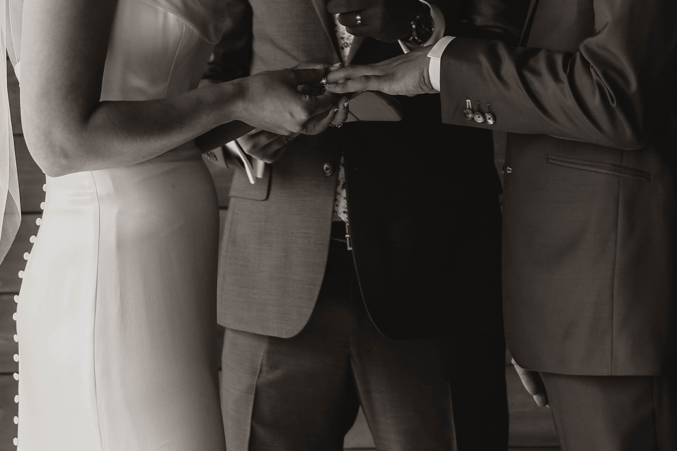 bridal couple exchanging rings 