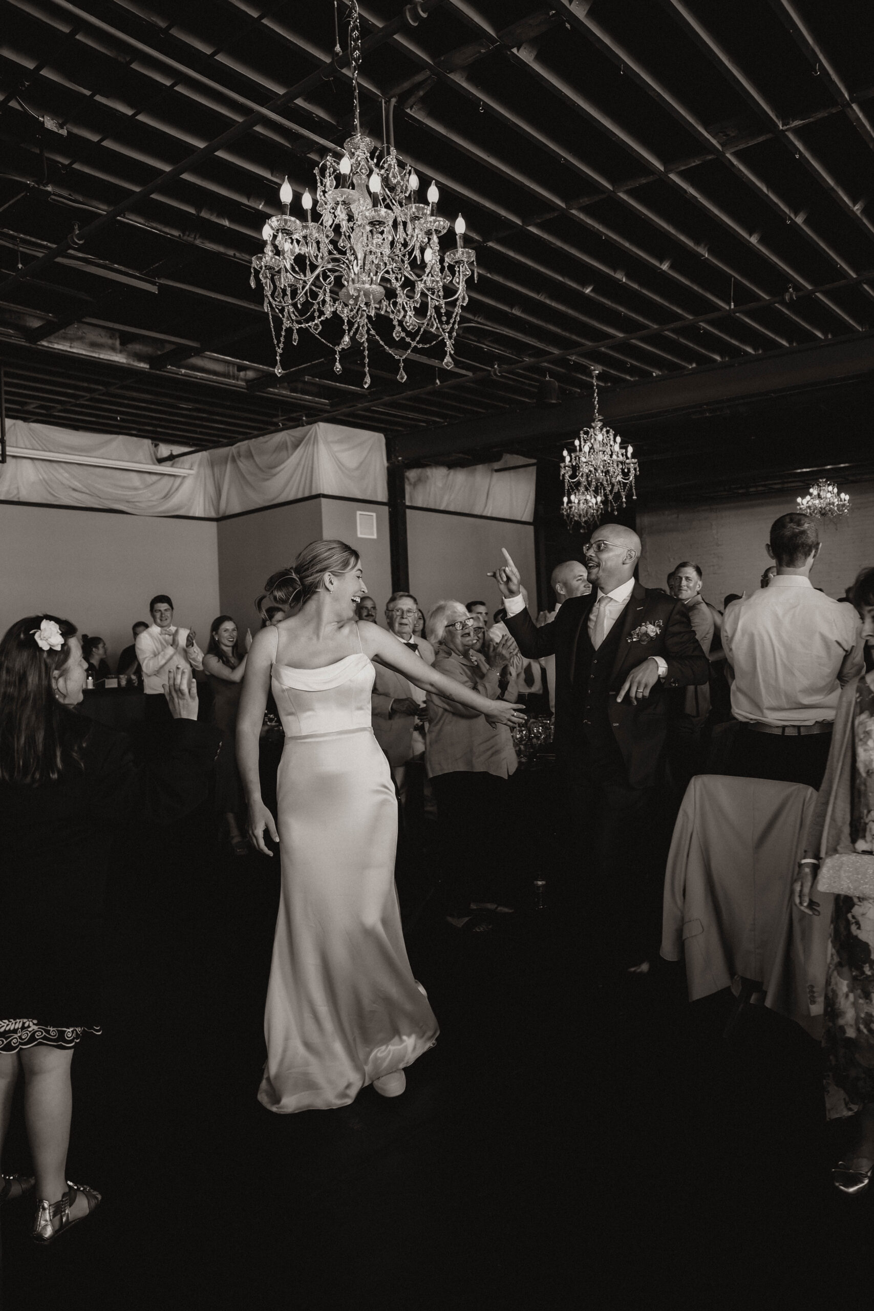 bride and groom walking to do the first dance one of the most perfect Denver Colorado venues