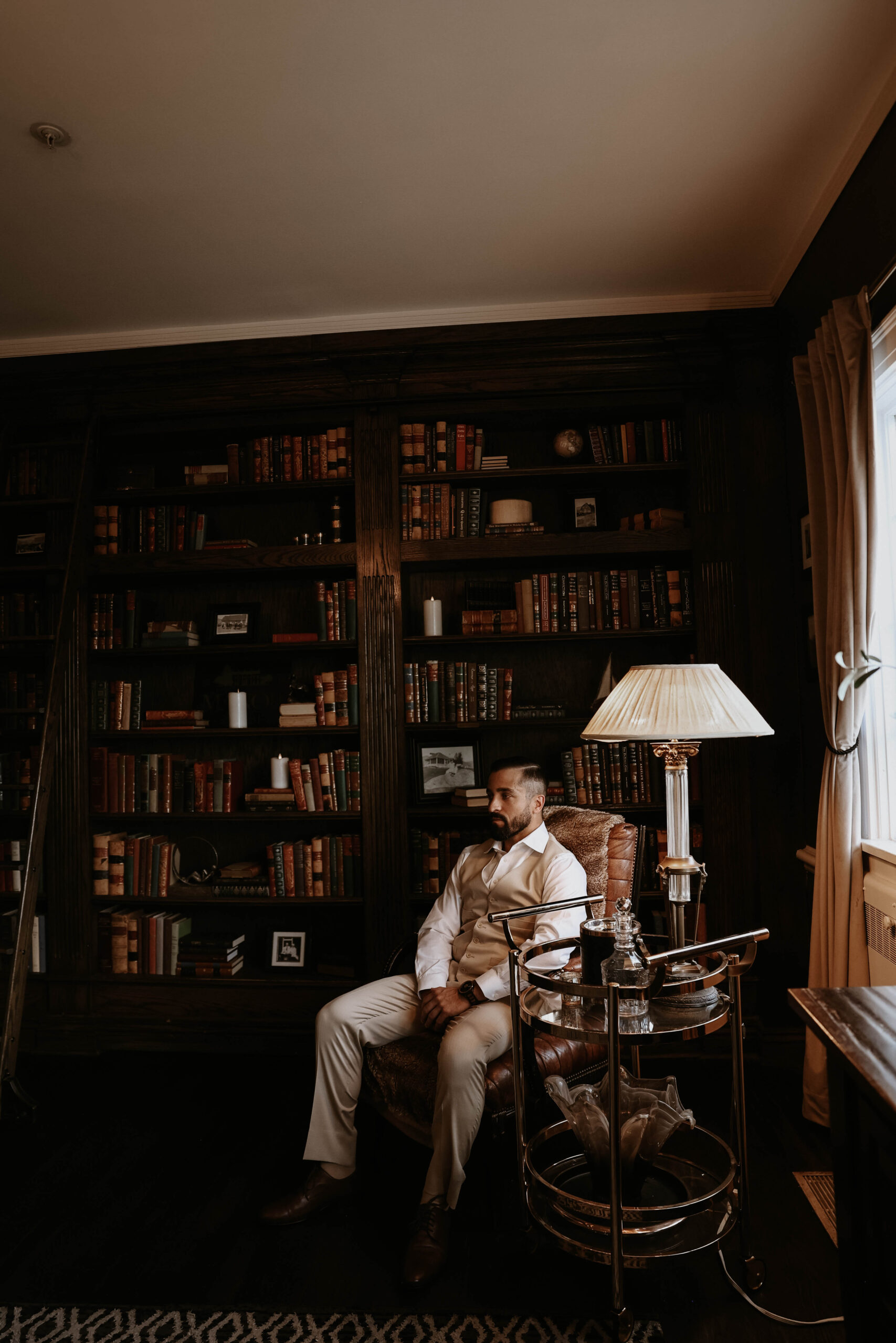 groom in his getting ready space at manor house