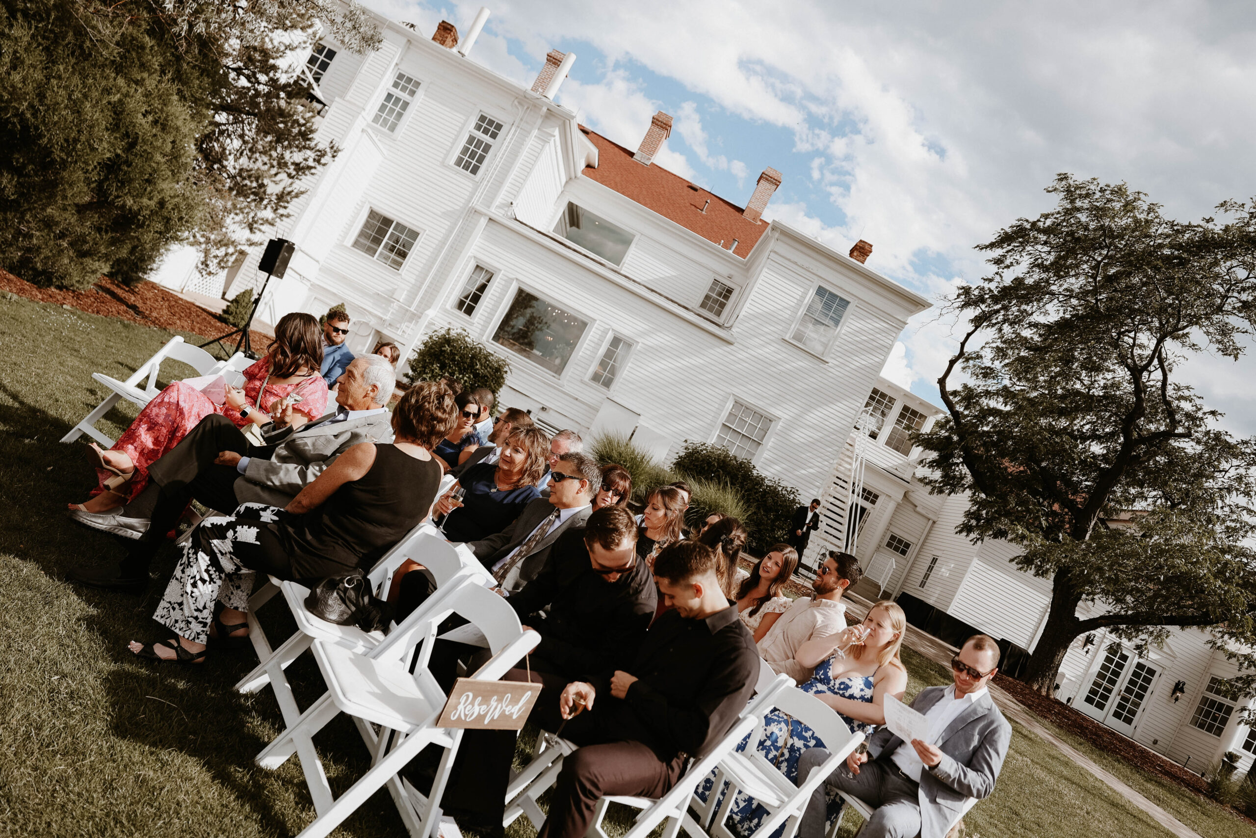 guests sitting waiting for the ceremony to start 