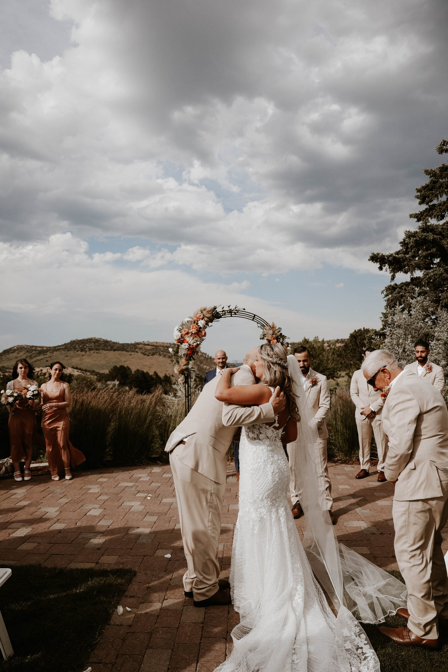 bride and her father hugging 