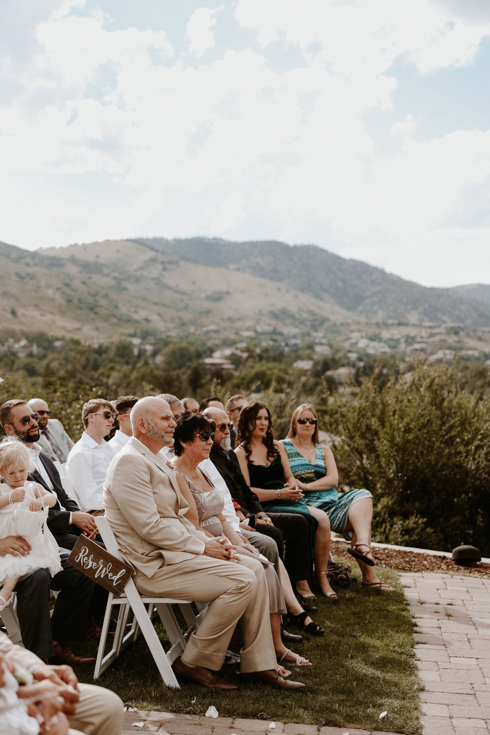 manor house wedding guests during ceremony 