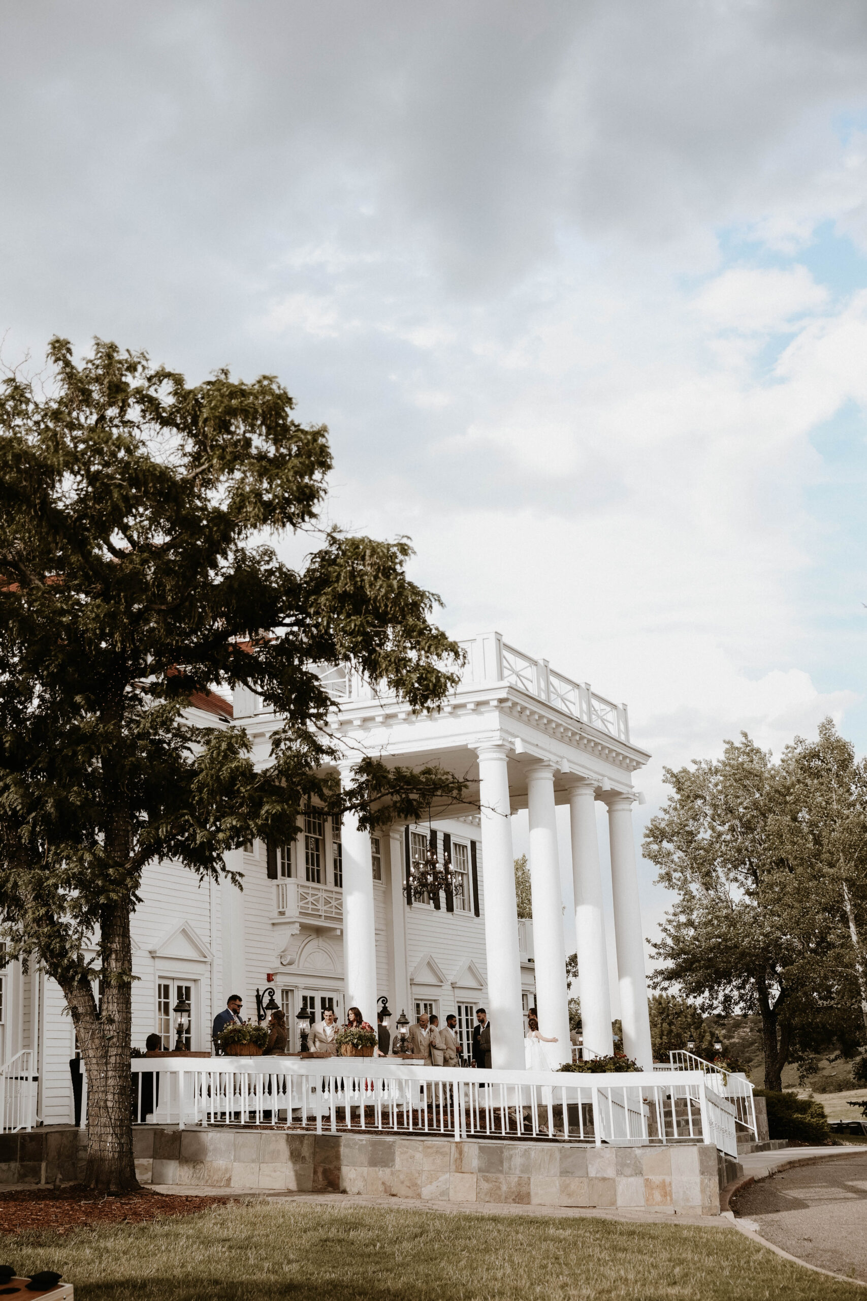 guest outside manor house wedding venue