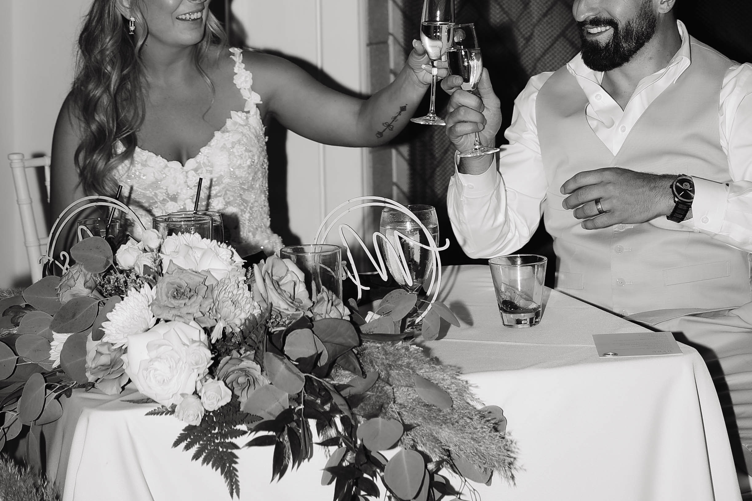 bride and groom toasting 