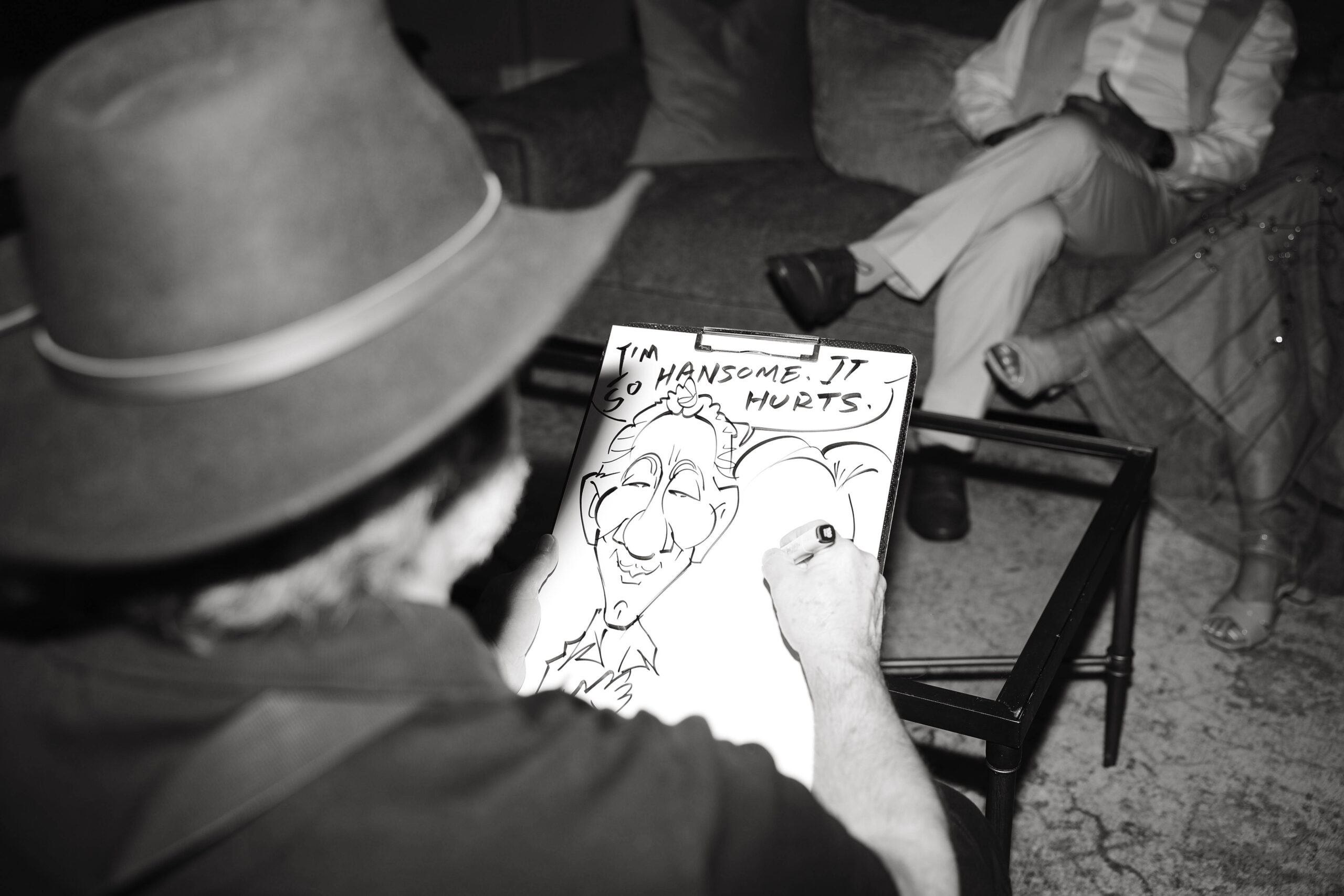 caricature's drawing of guests 