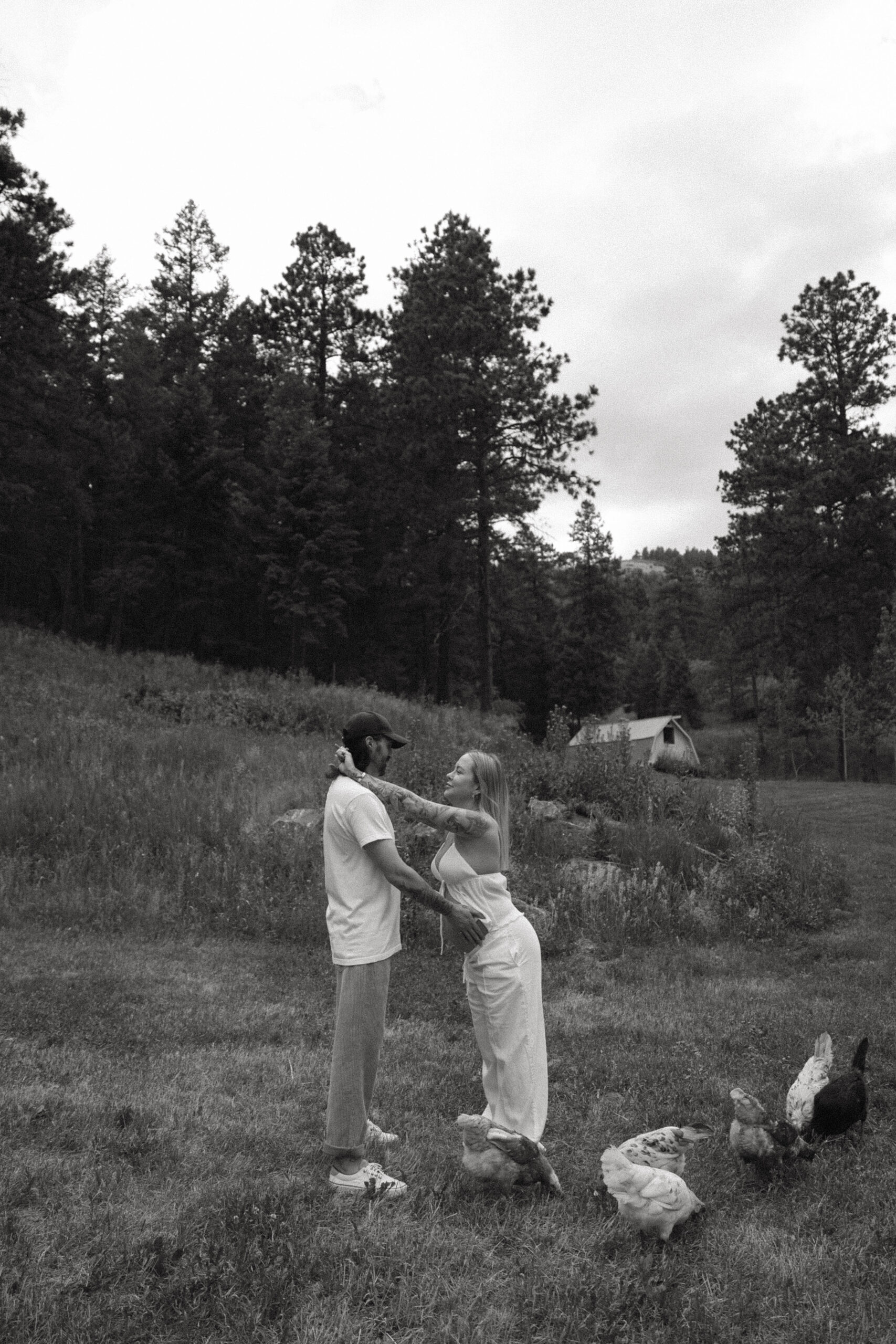 a couple holding each other during a Denver Maternity Photography session 