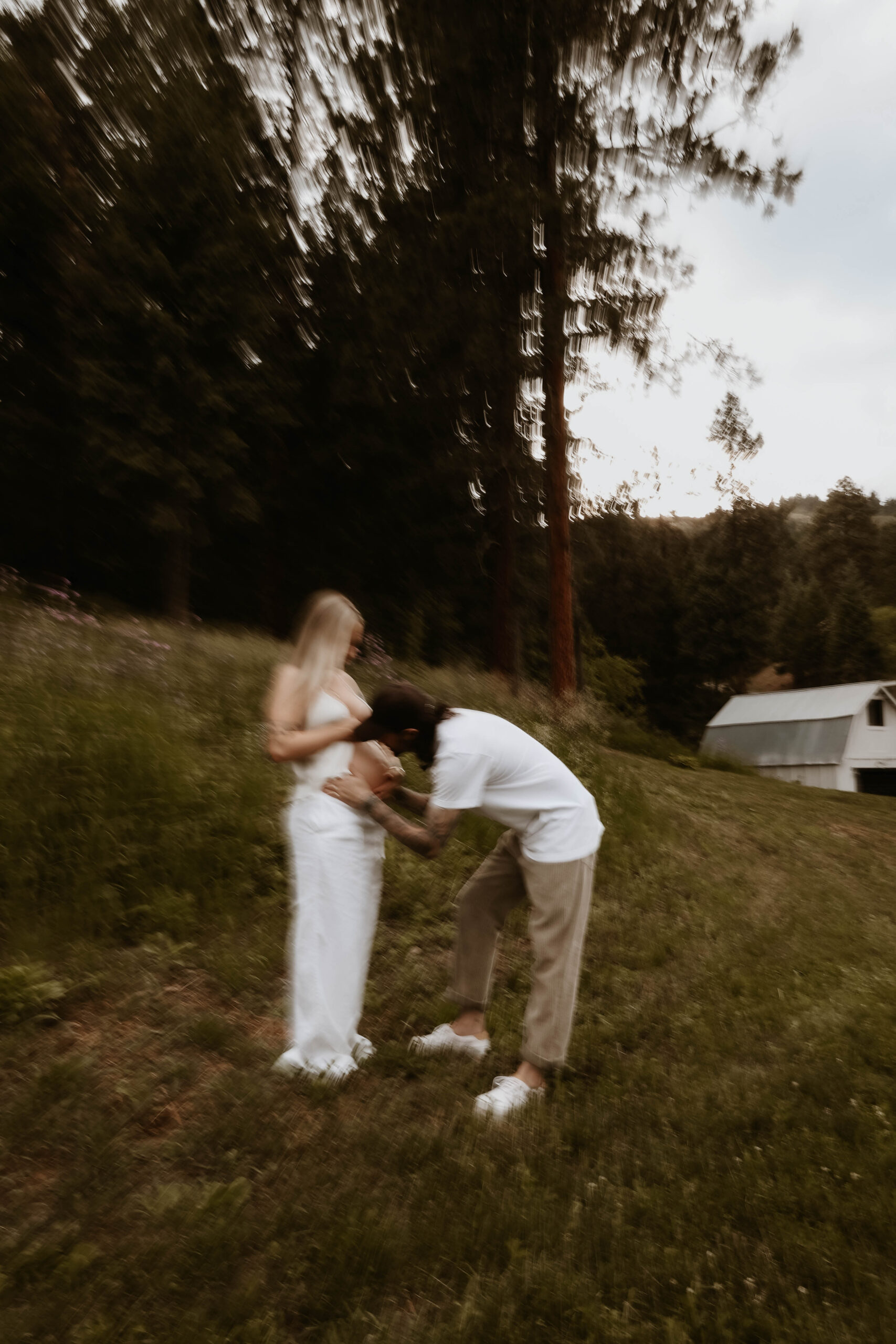 a blurry image of a couple during their denver maternity photography 