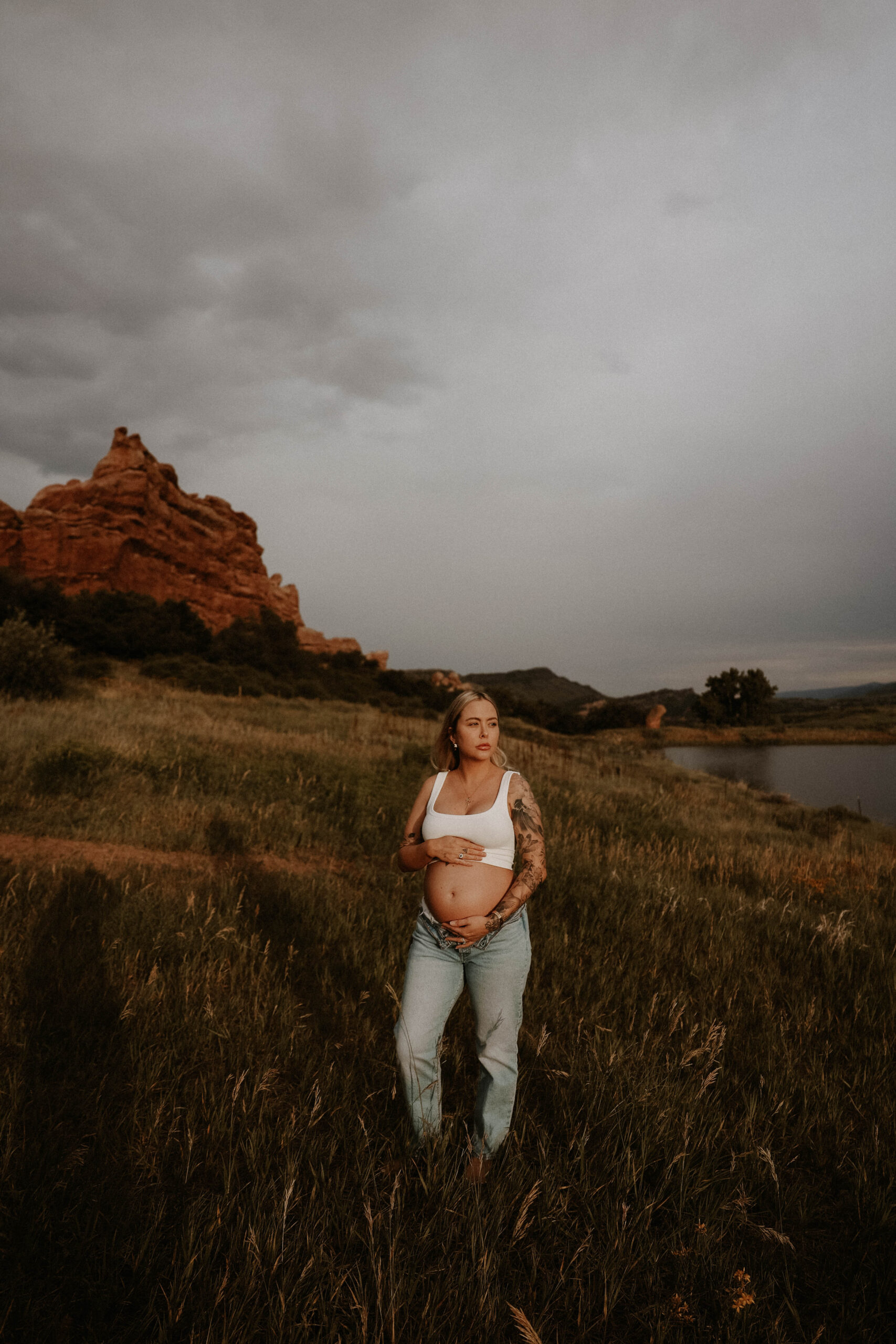 a pregnant woman during her golden hour maternity session 