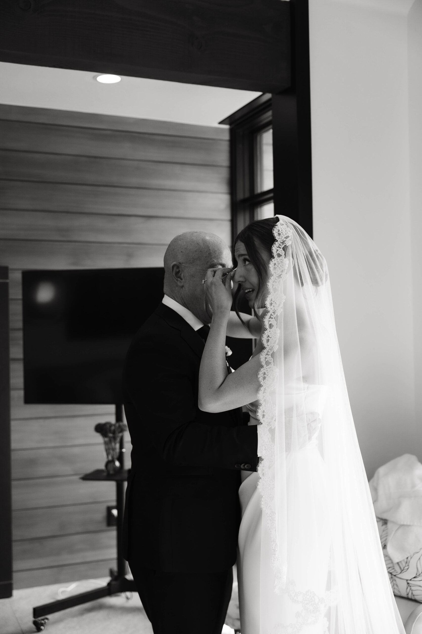 bride and her dad sharing a moment at her Colorado micro wedding