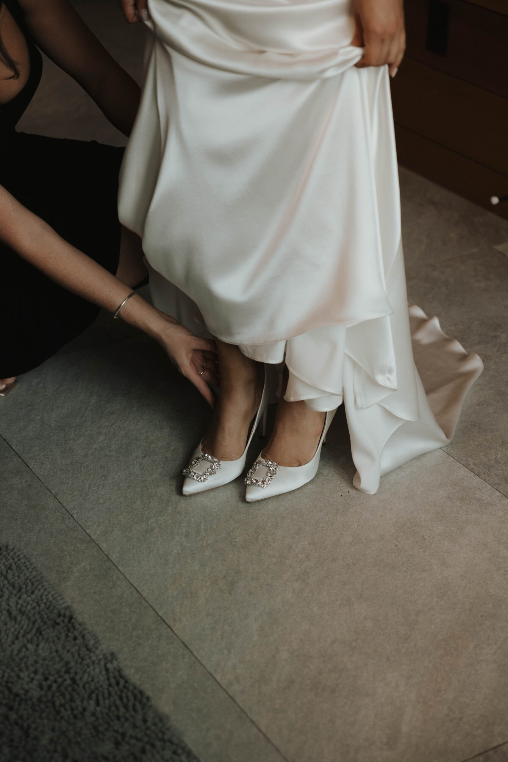 editorial detail shot of bride's heels