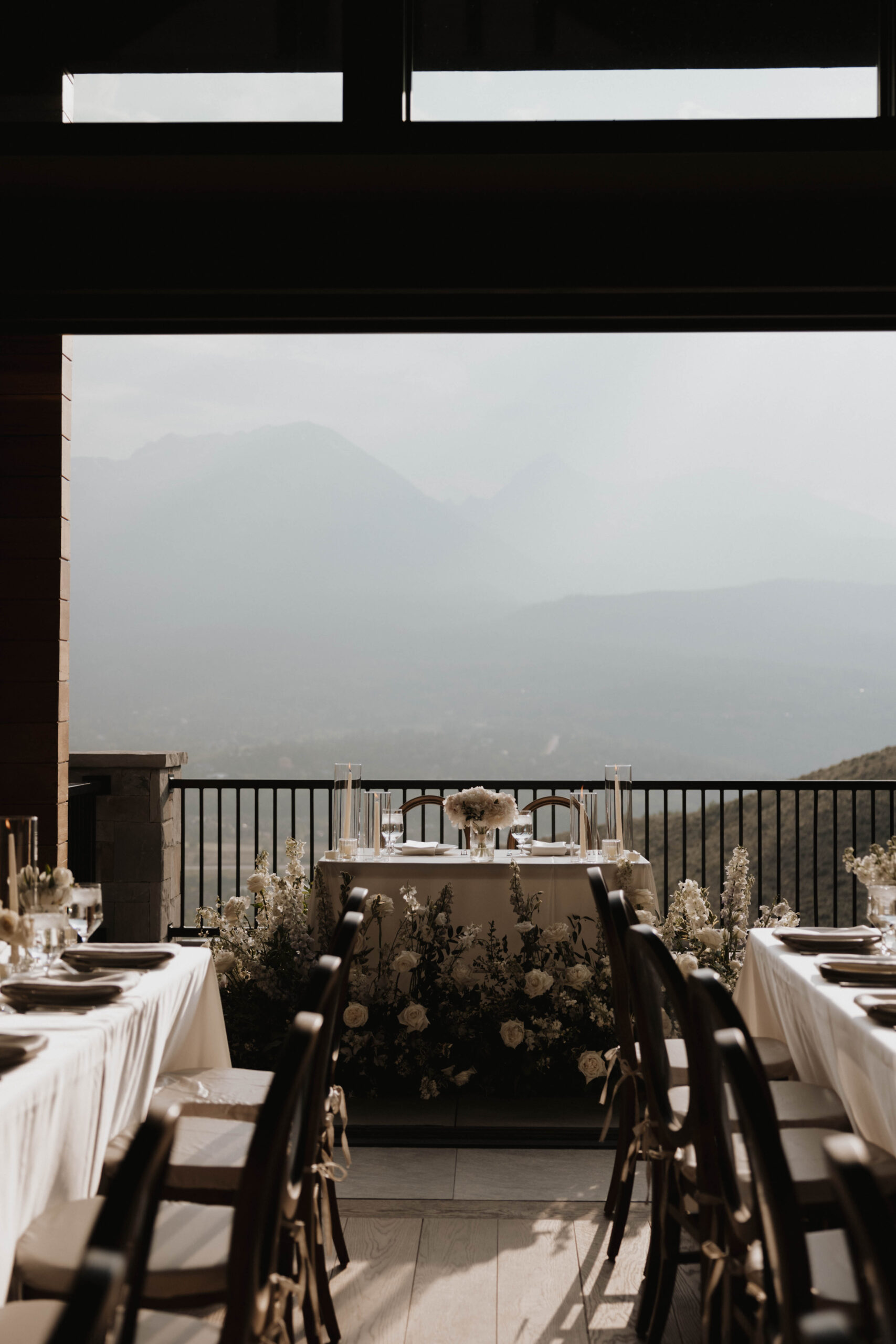 bride and groom head table on a balcony of a Colorado micro wedding