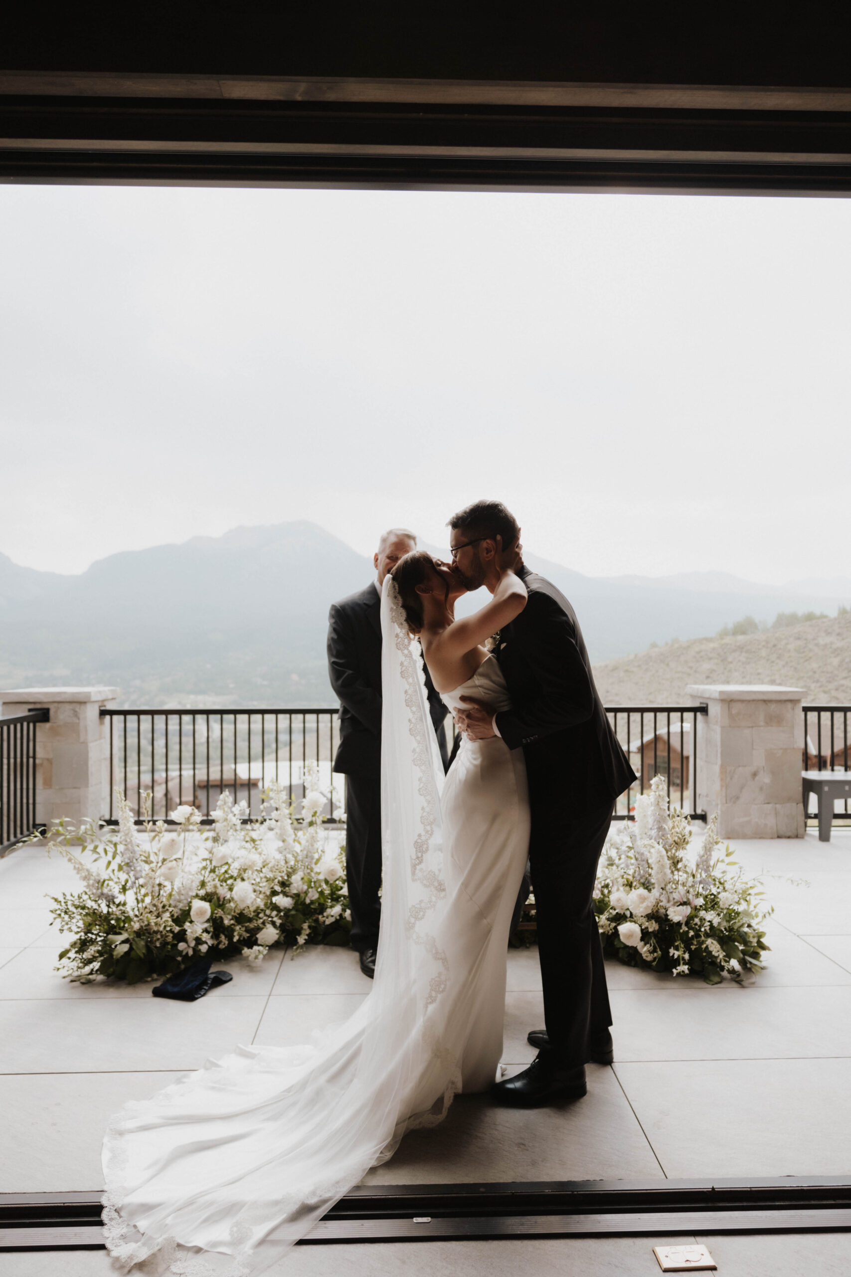 bride and groom kissing at the Colorado micro wedding ceremony