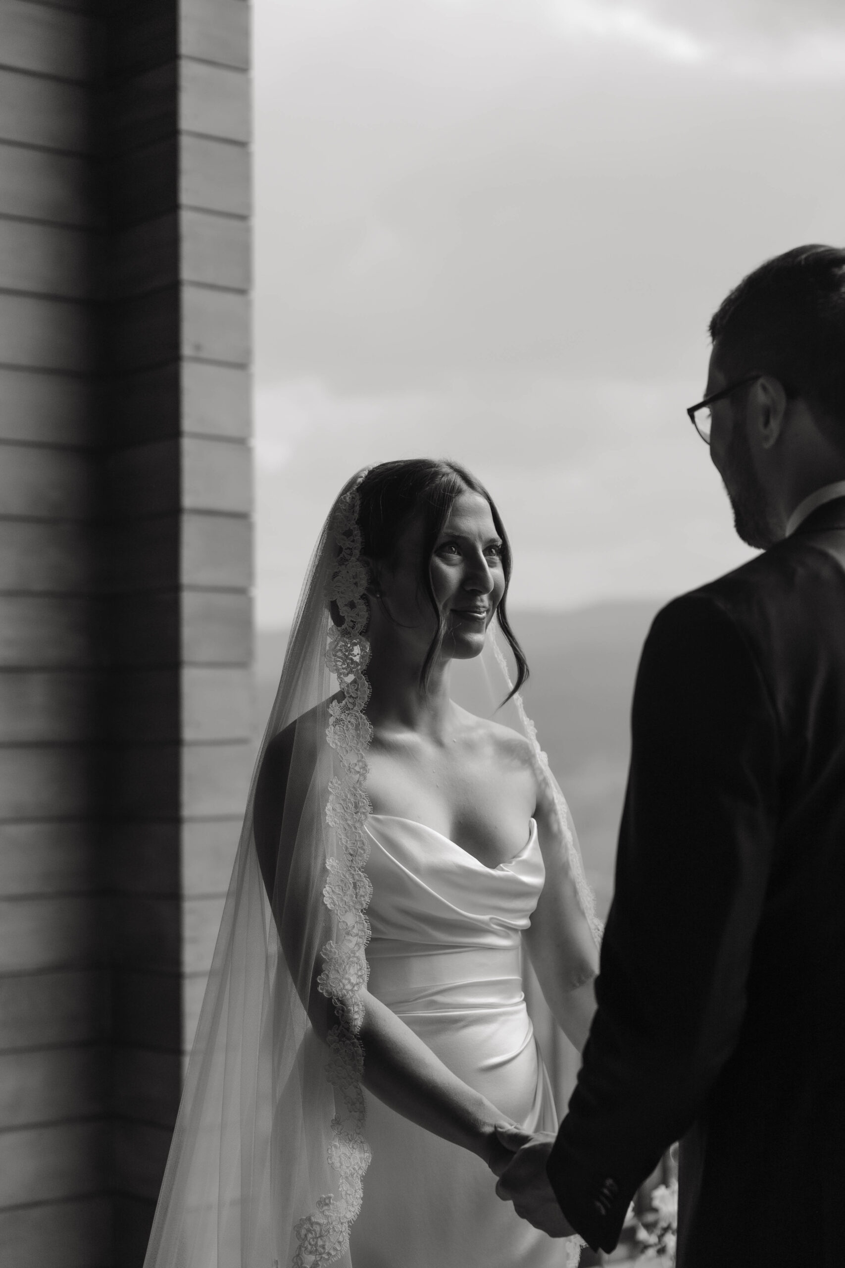 bride looking at the groom during a Colorado micro wedding ceremony