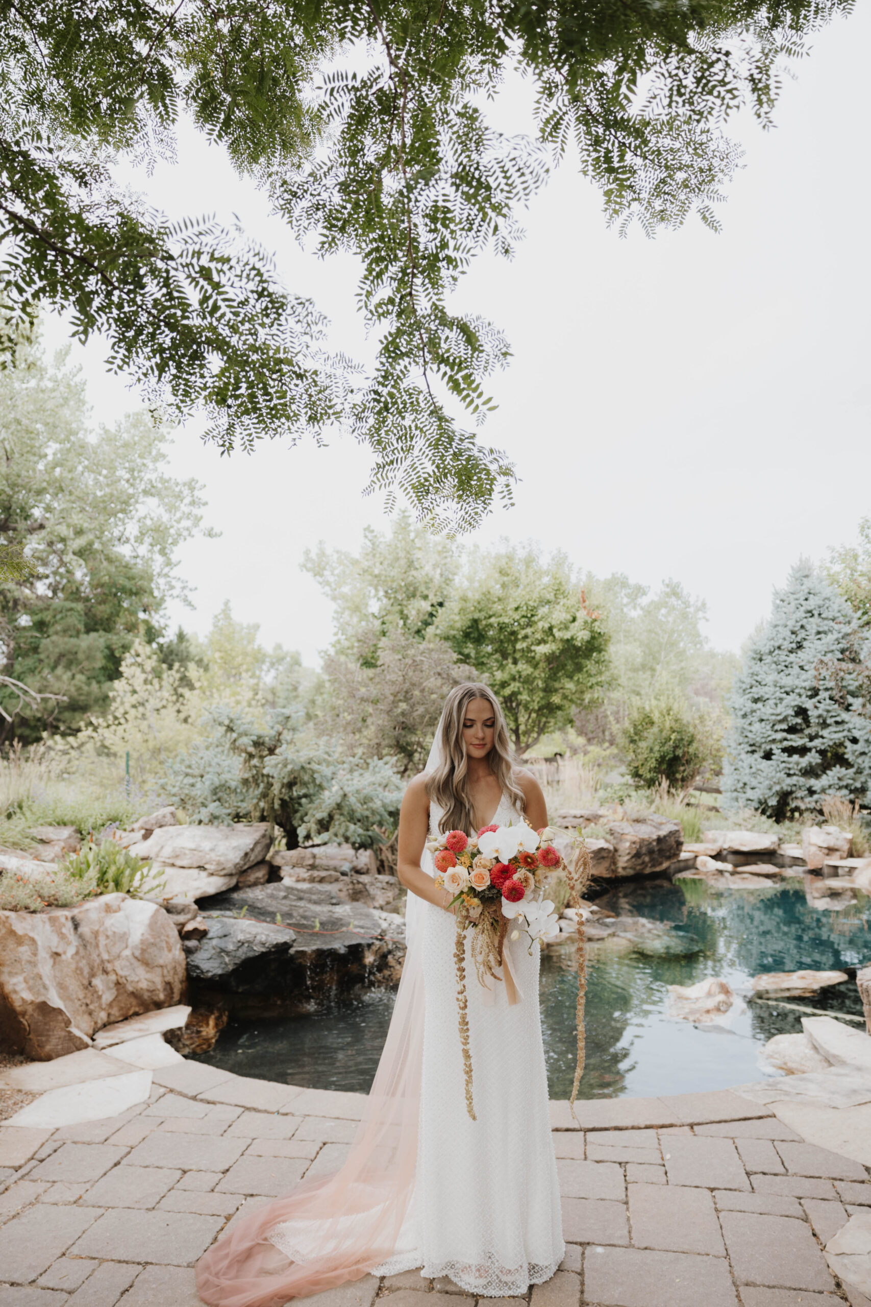 bride photoshoot with colorful wedding bouquet 