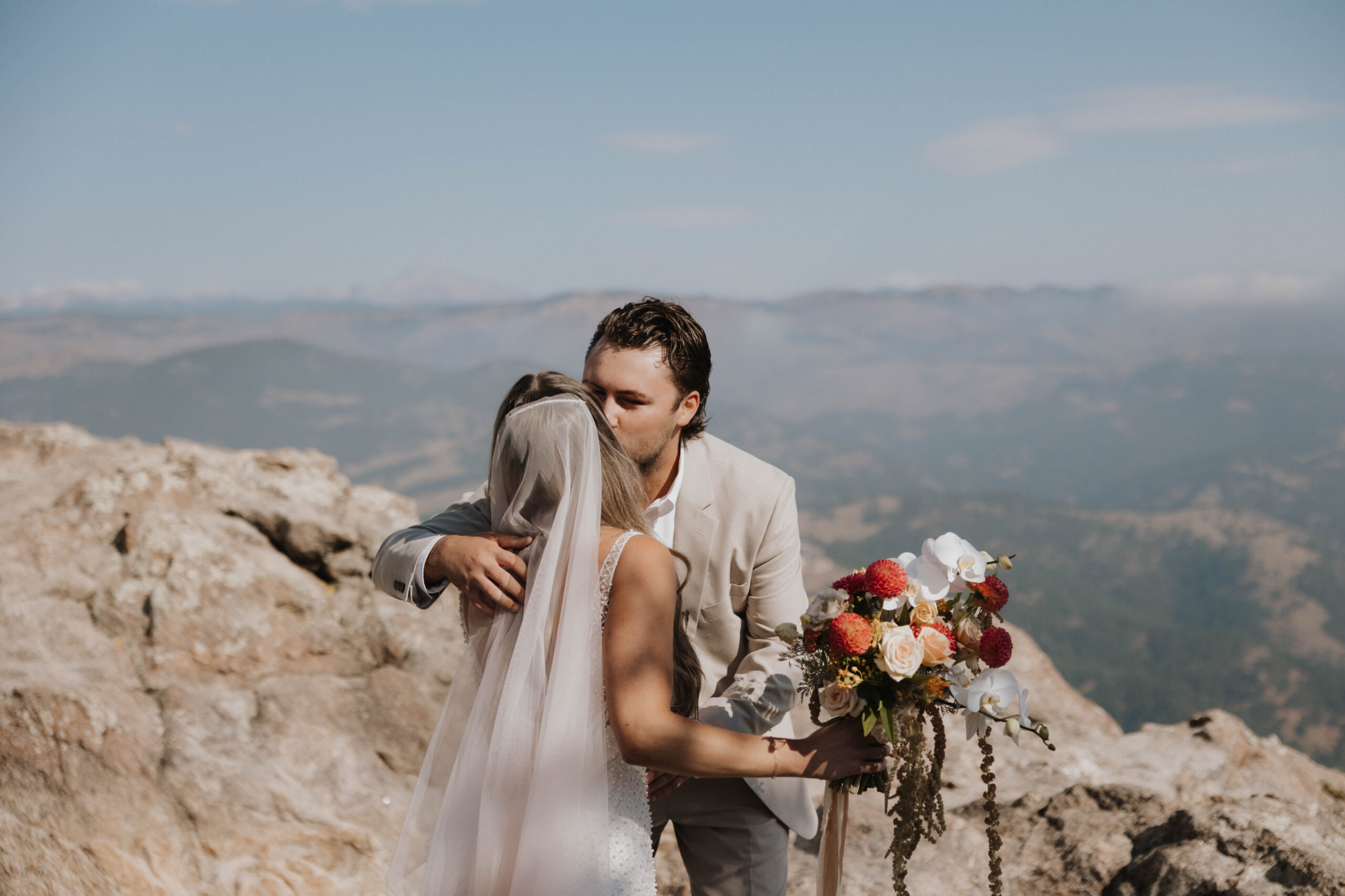 bride and groom sharing a kiss 