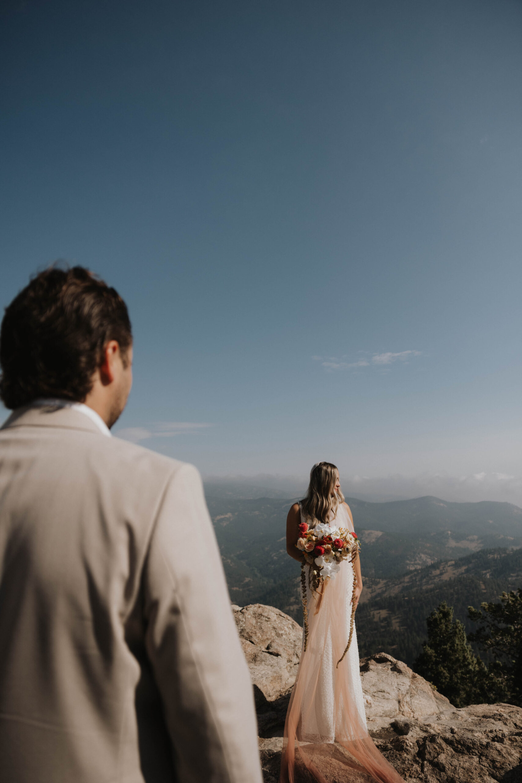 groom looking a this bride