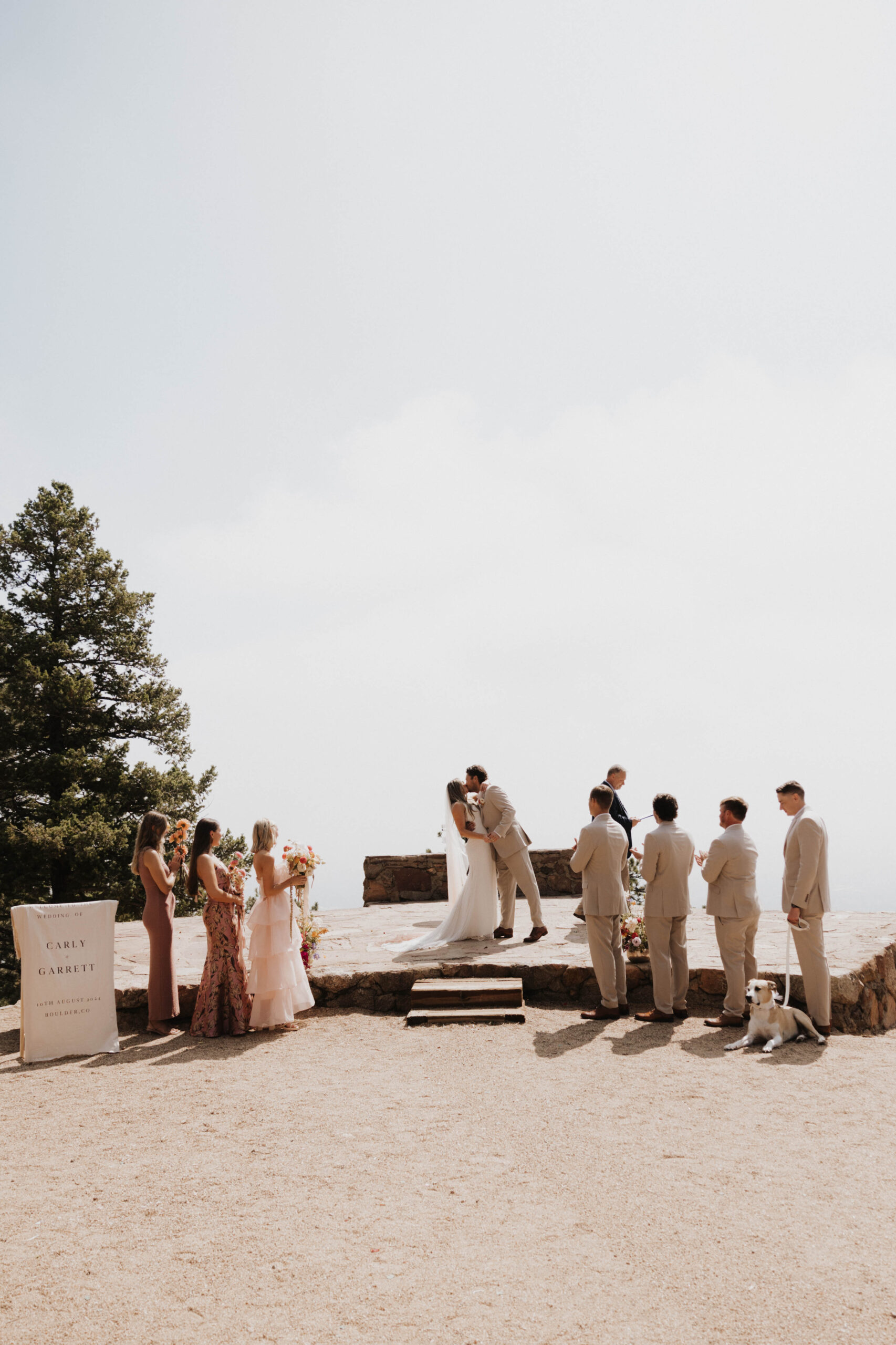 bride and groom kissing at Boulder Colorado wedding ceremony 