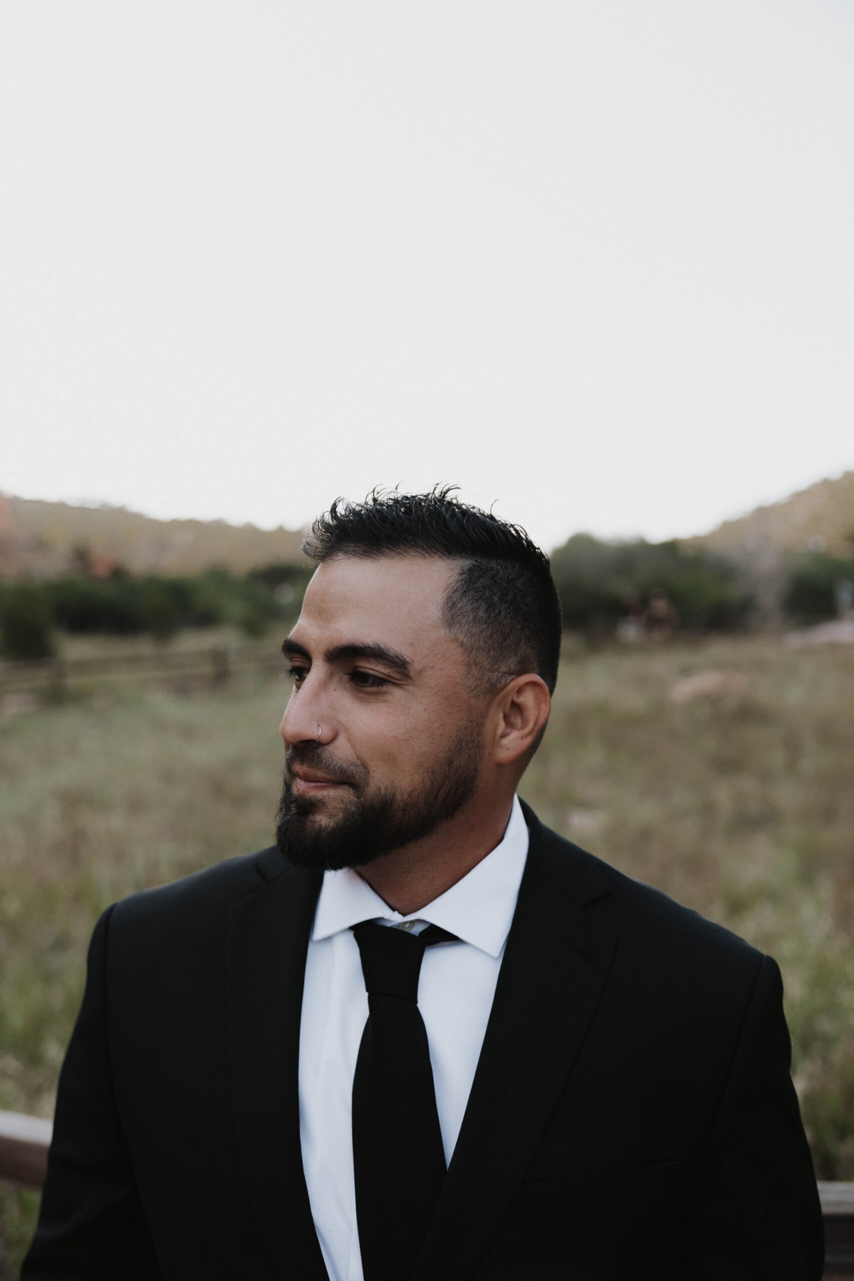 groom at his wedding at garden of the gods