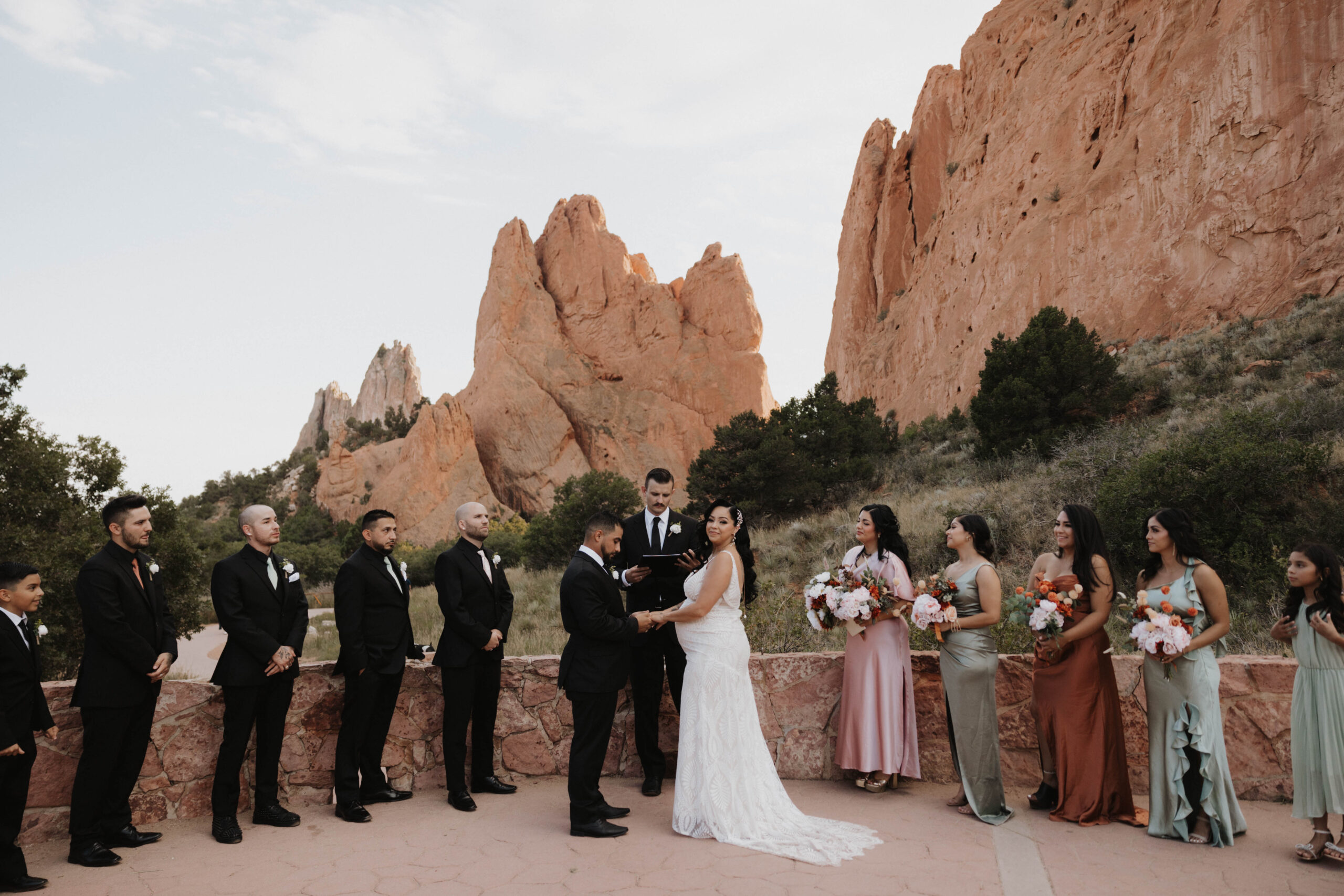 wedding party at the altar during the ceremony 