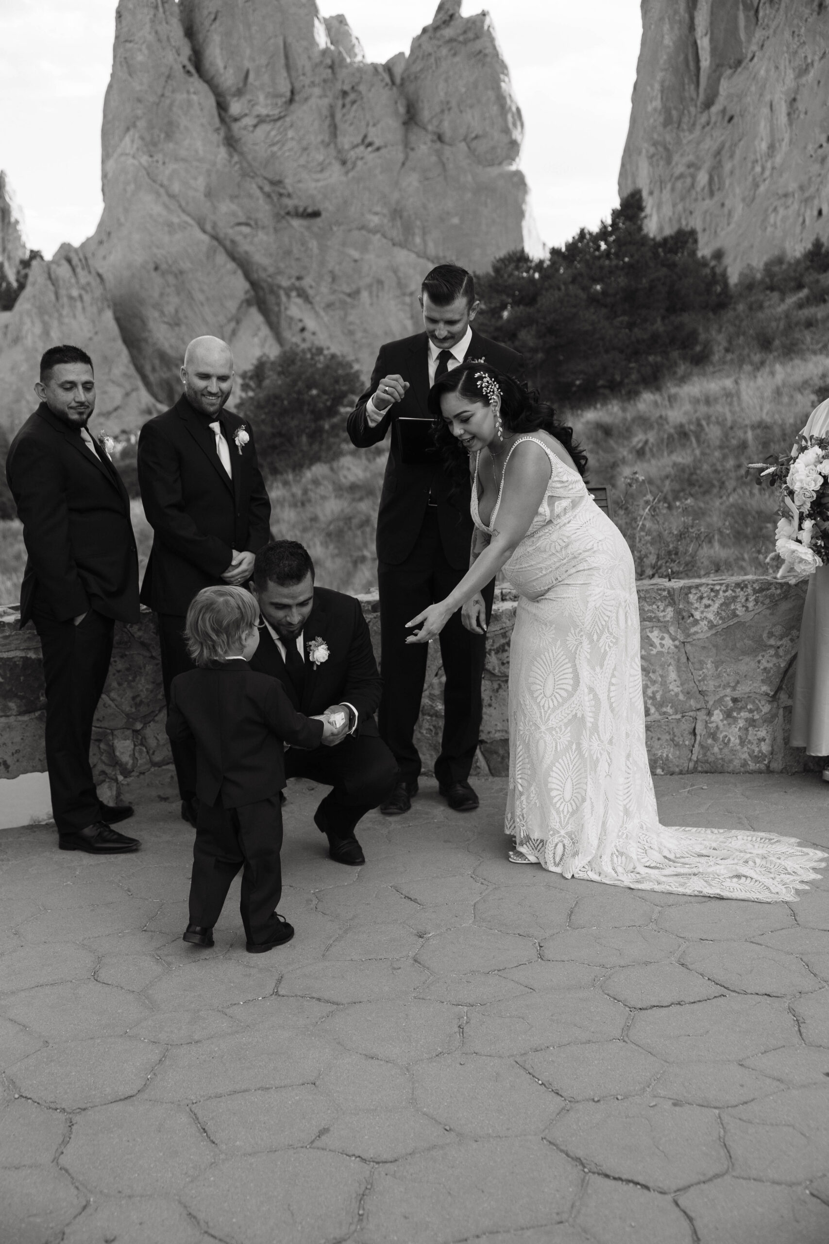 ring bearer handing over the rings for wedding at garden of the gods