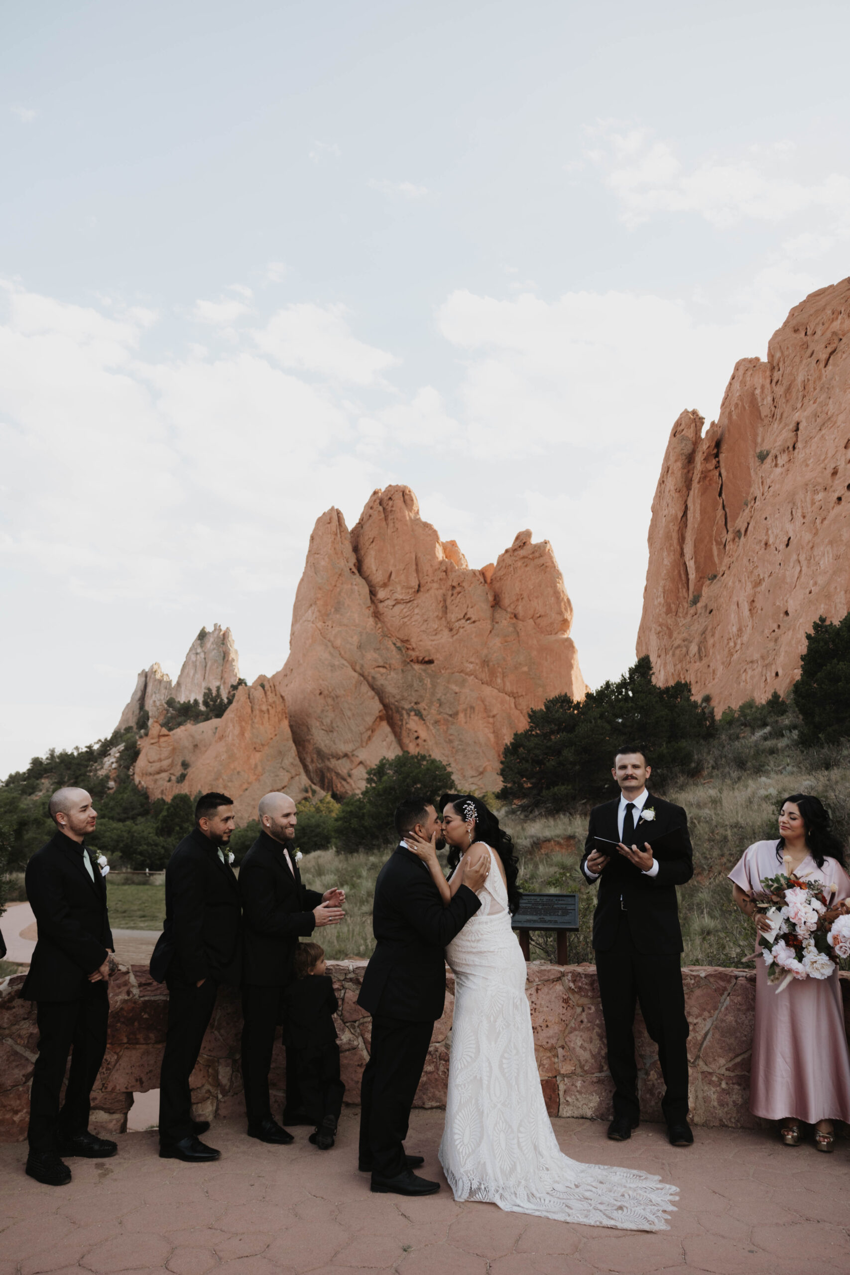 bride and groom kissing after wedding at garden of the gods ceremony