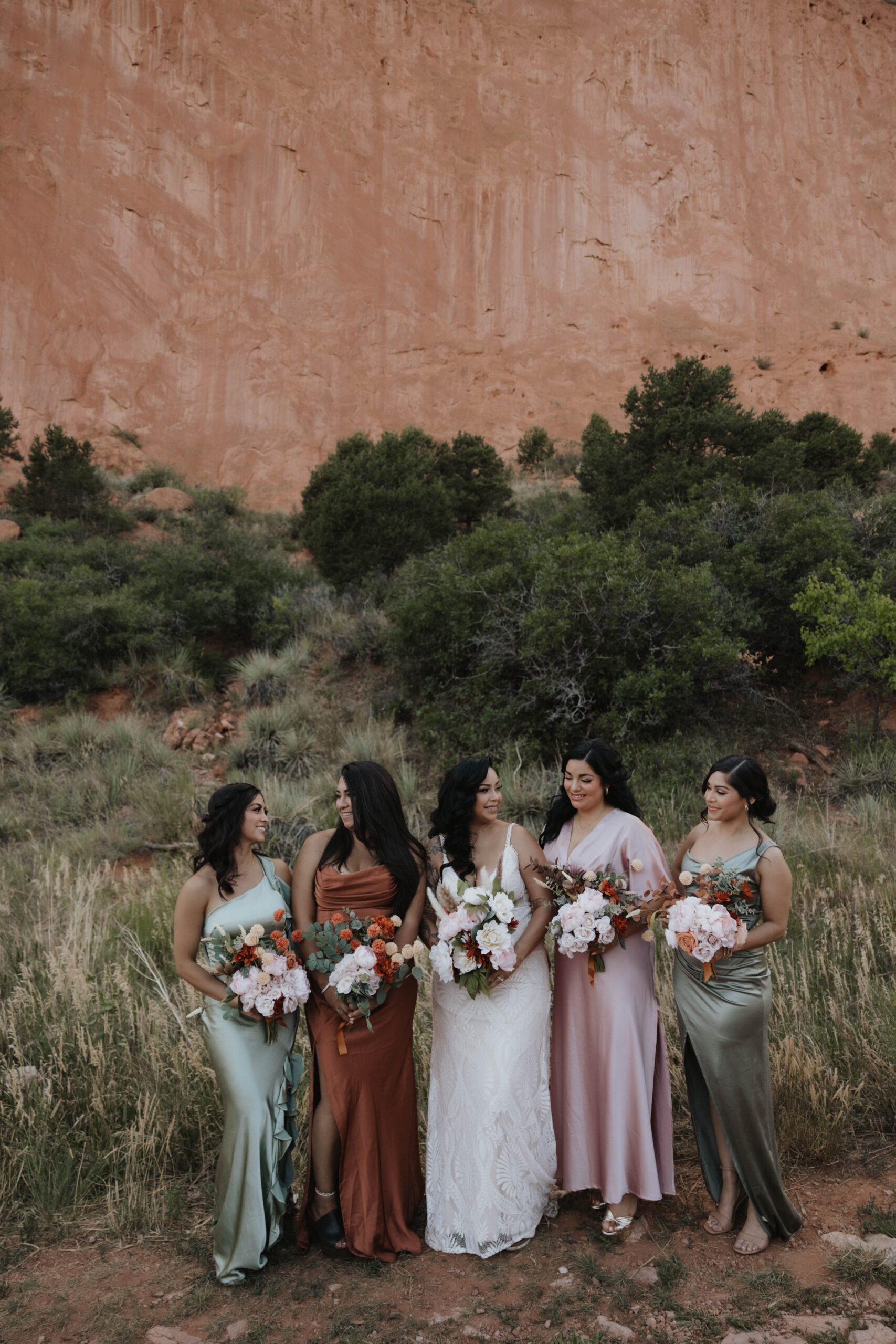 bride and her bridesmaids at wedding at garden of the gods